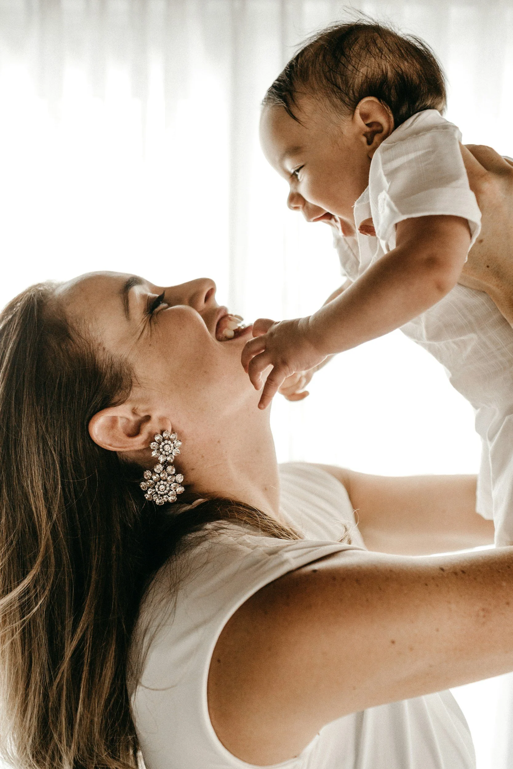 Mother bonding with her baby while healing from postpartum depression and growing in confidence as a parent