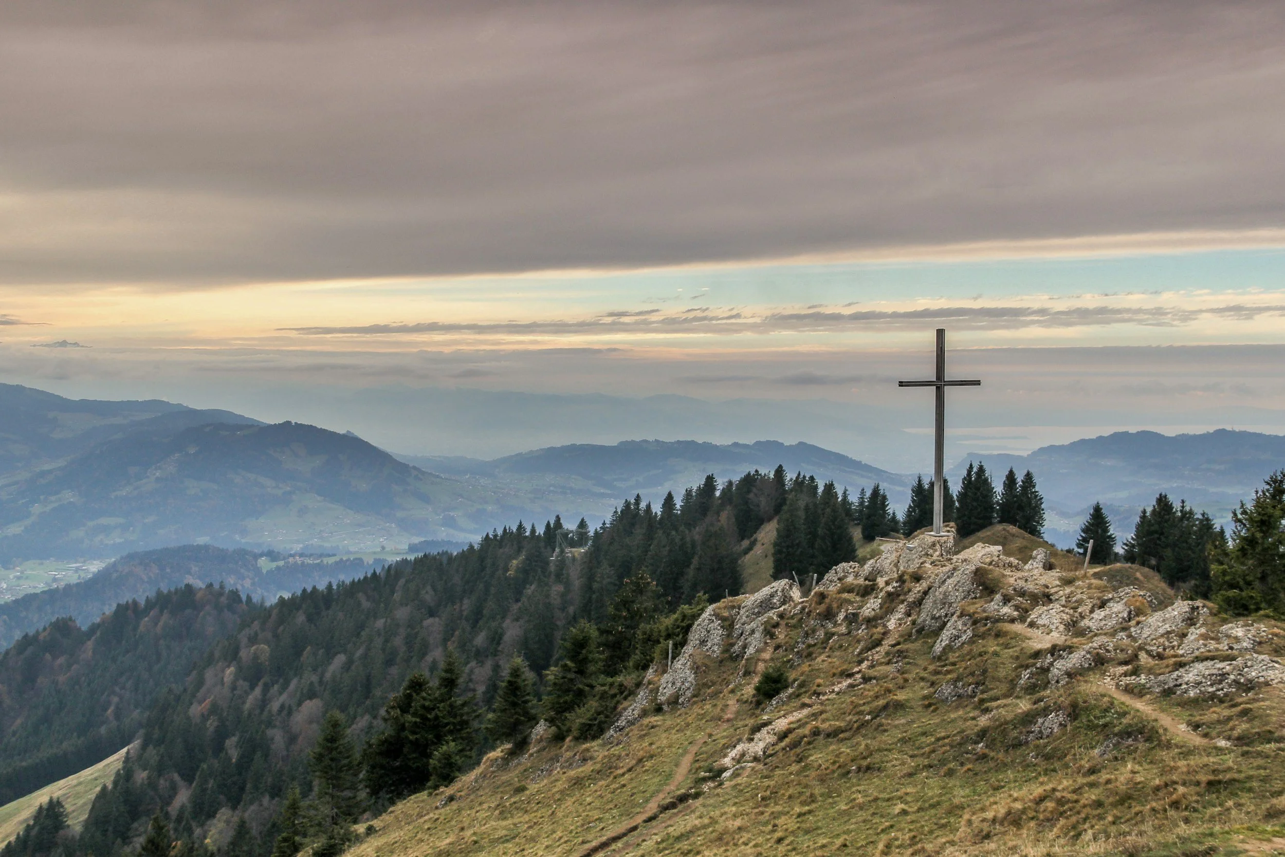 Cross on a mountain overlooking the landscape representing faith, hope, and Christian counseling support in Big Lake, Minnesota