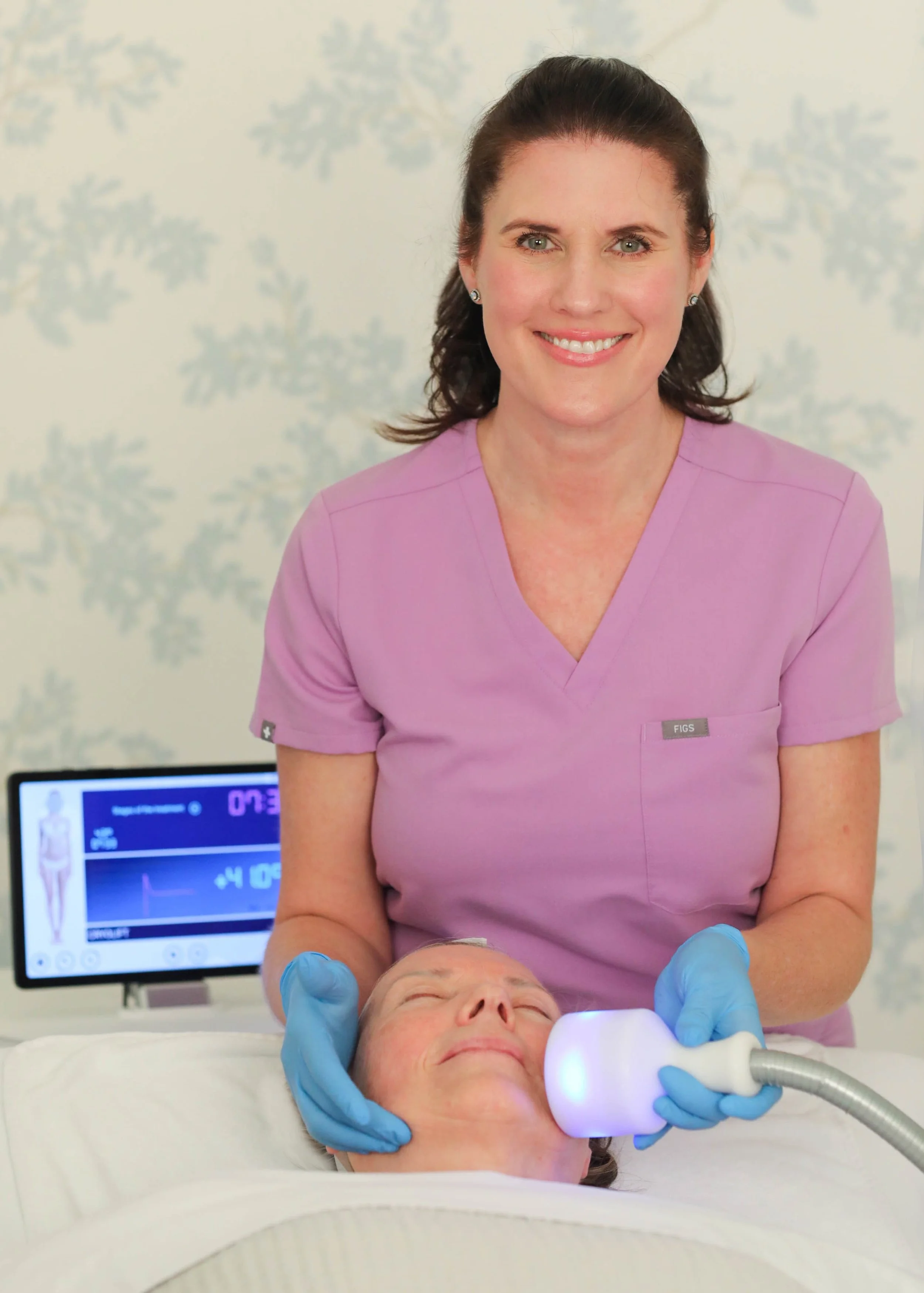 Paula giving a facial at her baton rouge office