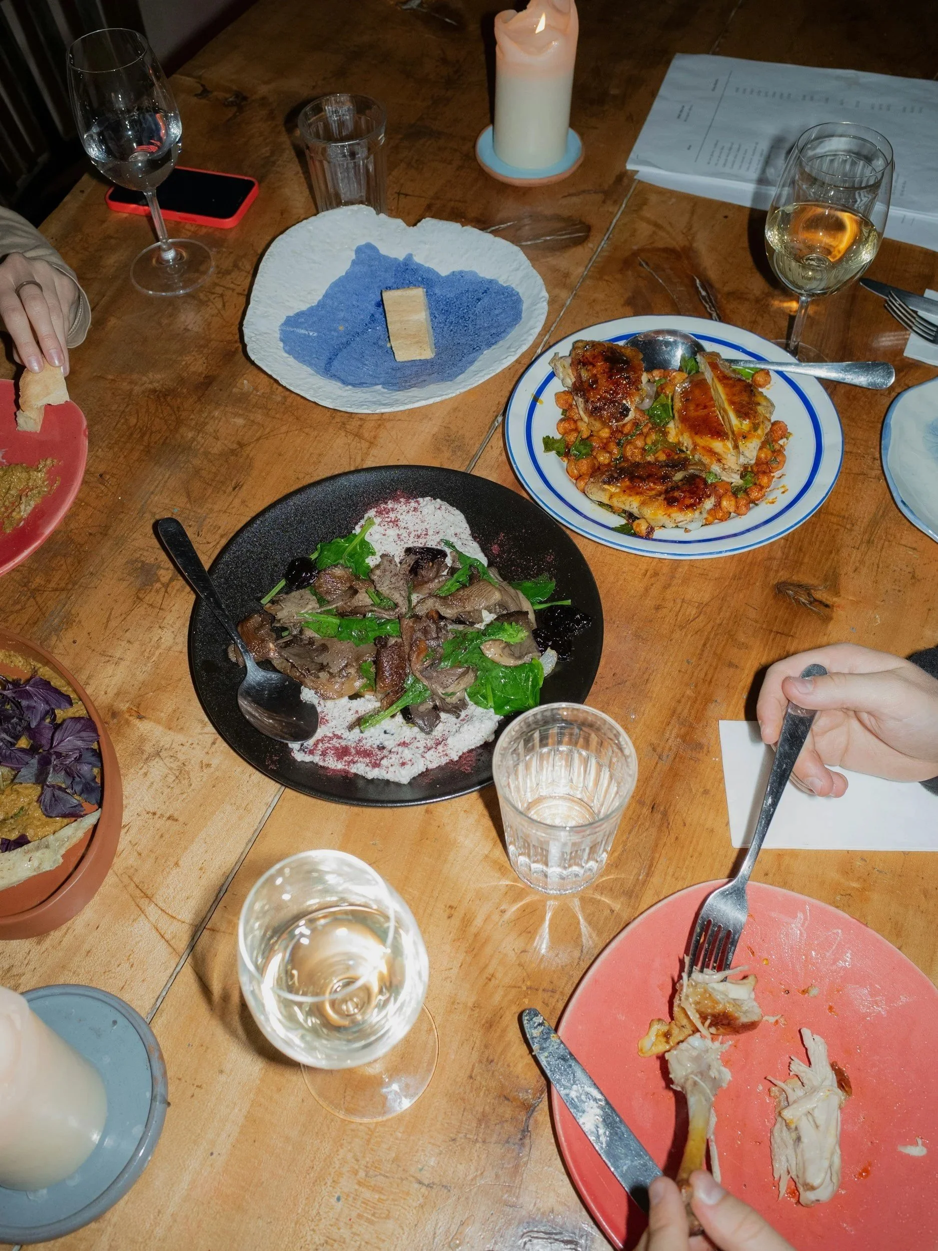 An artfully set restaurant dinner table.