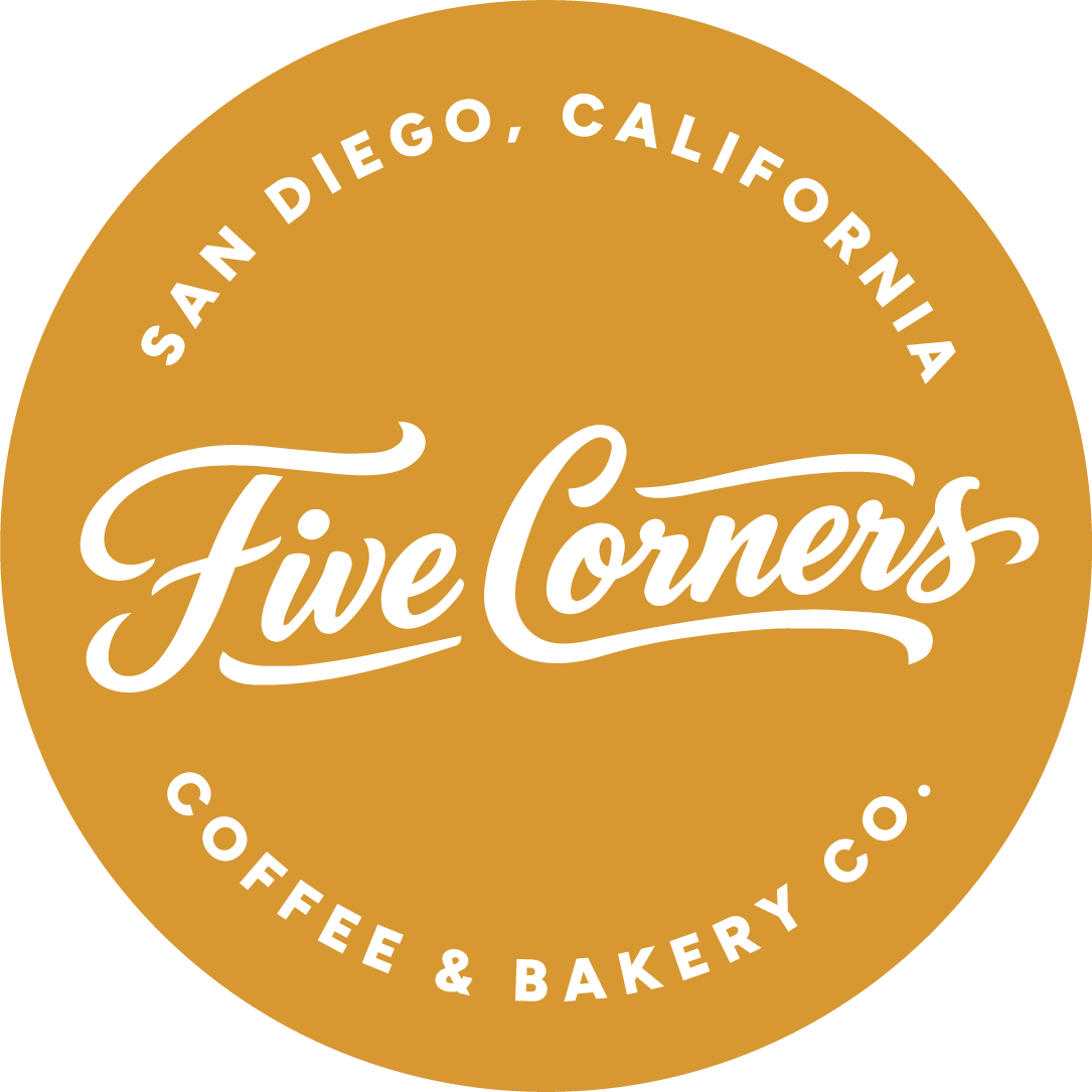 Five Corners Coffee & Bakery Co. logo - white cursive text over gold