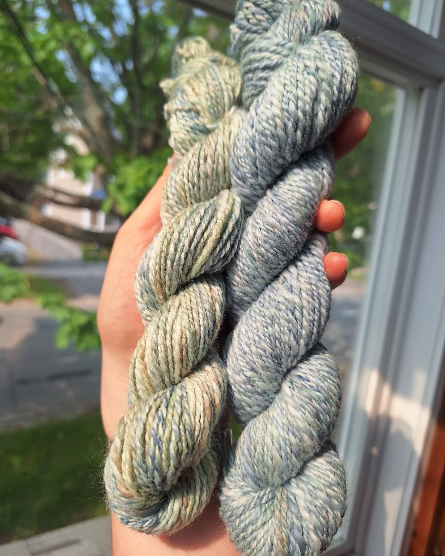 Hand-spun, acid dyed merino. The first two skeins spun on my new-to-me spinning wheel!