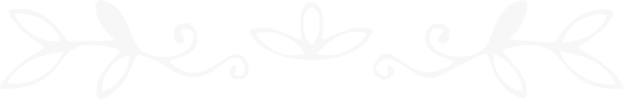 Decorative, black and white floral design with swirls and leaves.