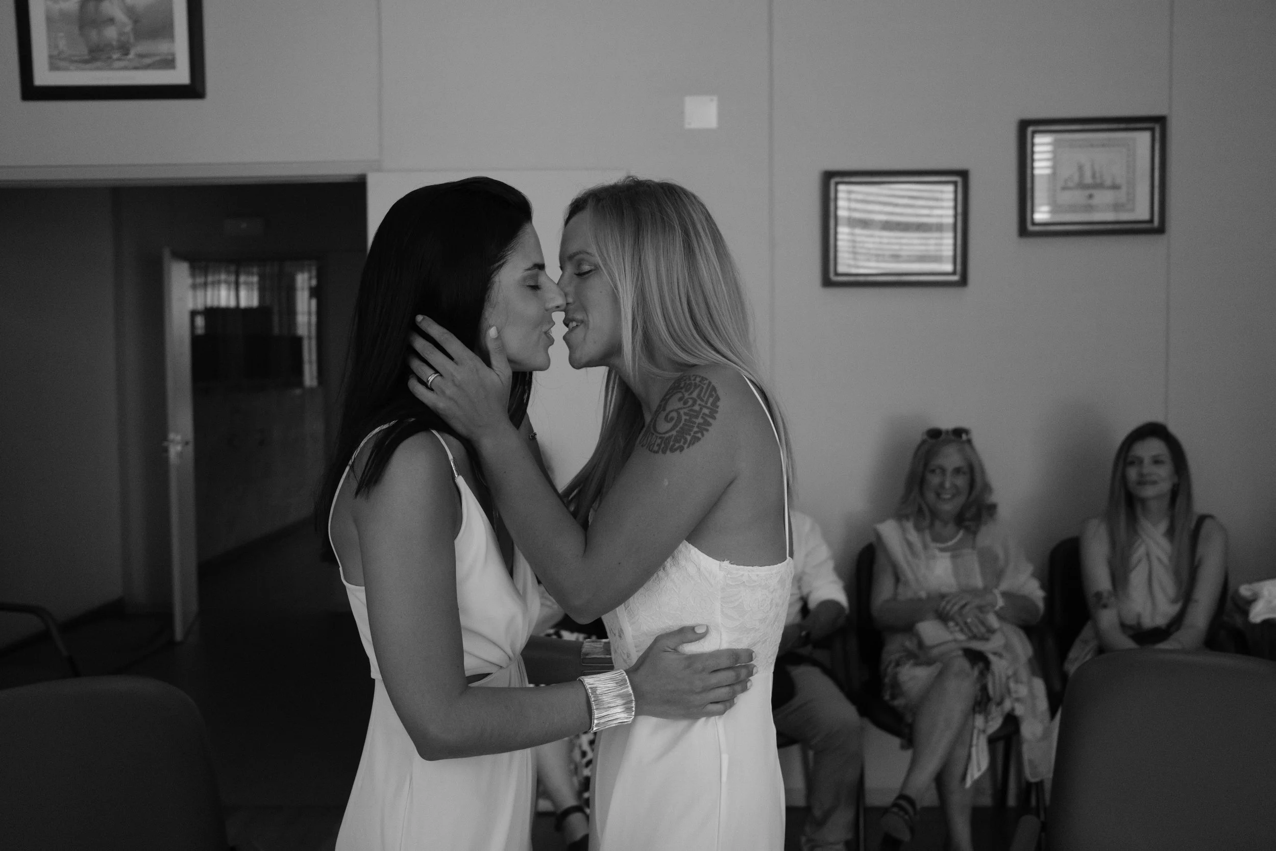 Sofia and Leonor sharing their first kiss during their civil wedding ceremony in Cascais.