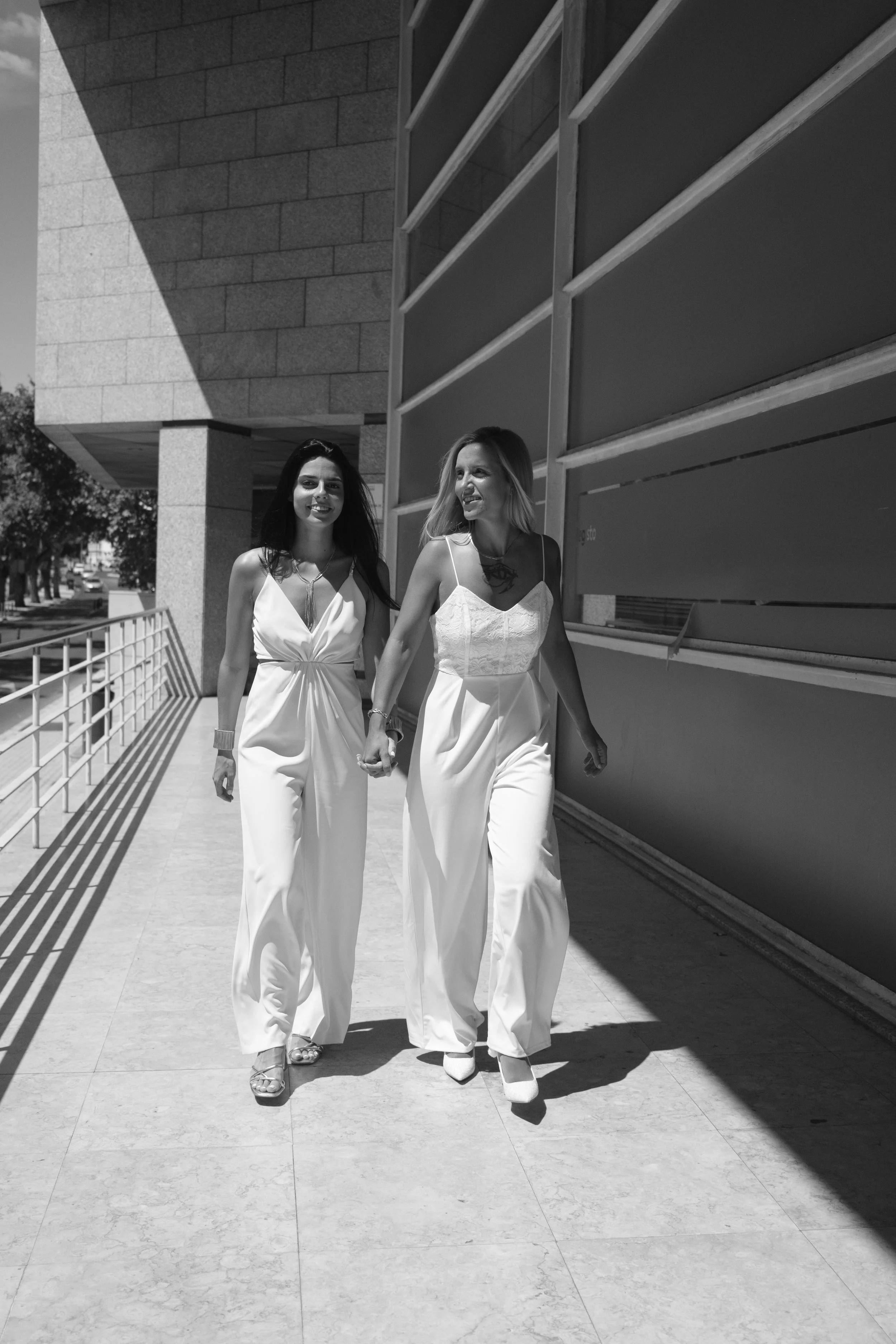 Sofia and Leonor leaving the registry office together after their wedding ceremony in Cascais.