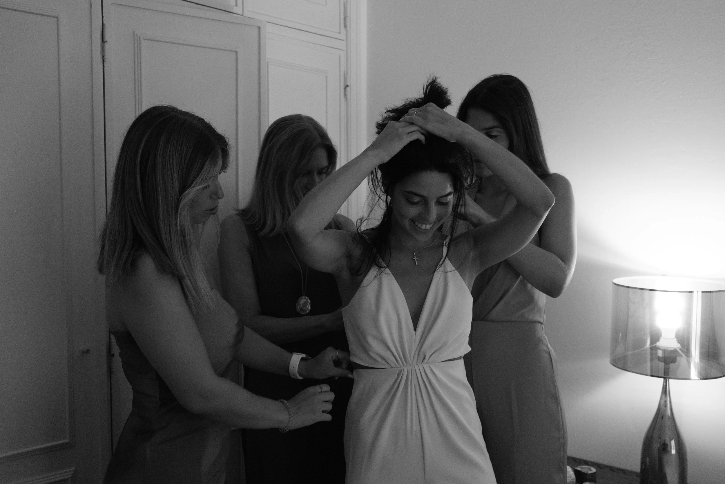 Family helping Leonor get ready for her wedding day.