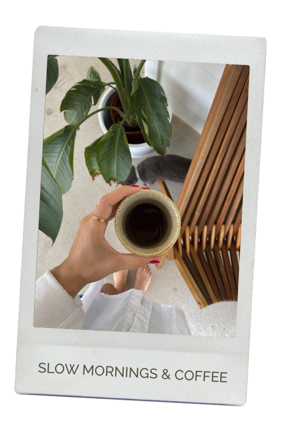 The Birth Atelier founder Kirsten Vogt holds a cup of coffee in New Jersey.
