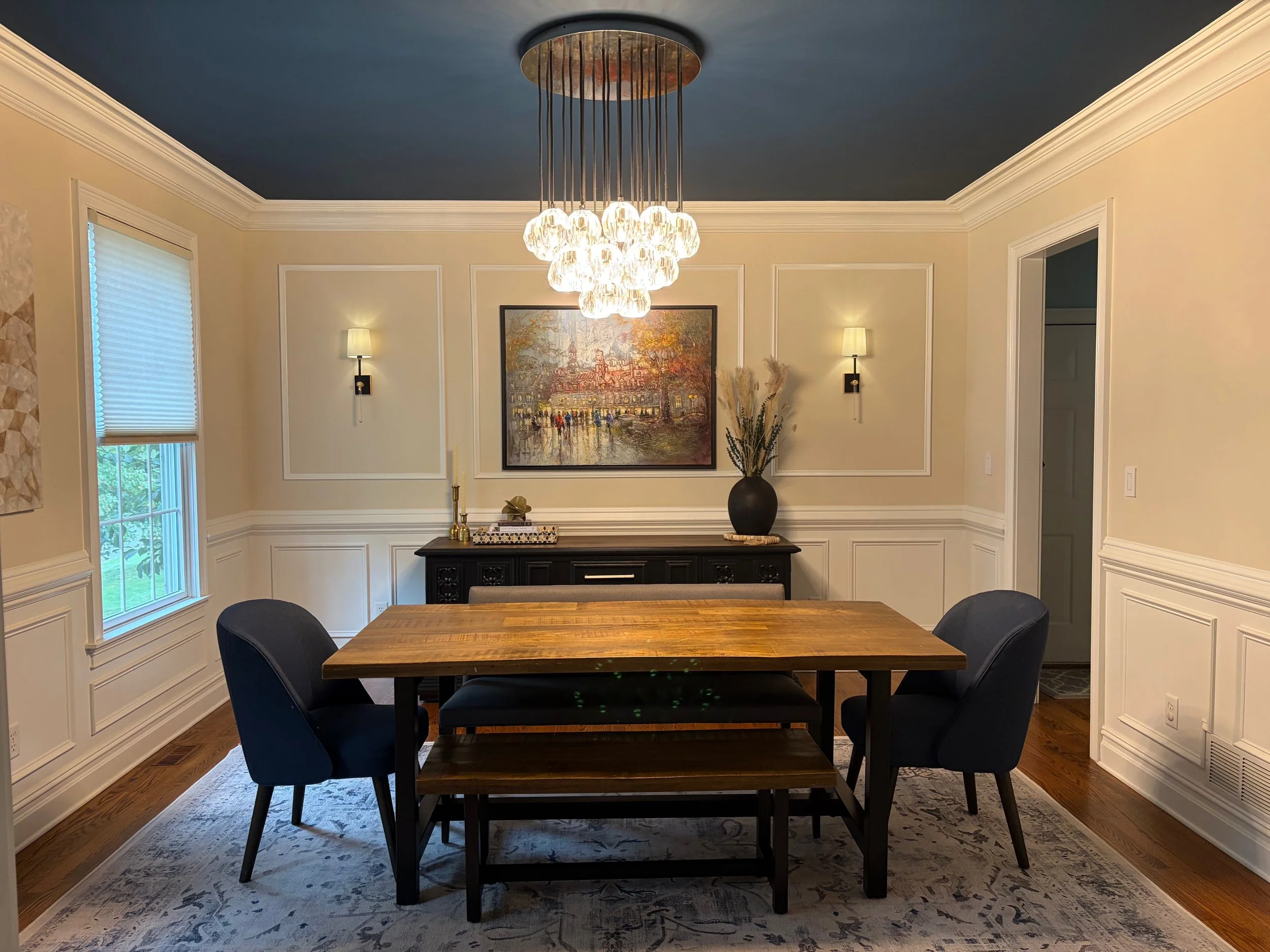 After: Cream walls and a dramatic blue ceiling