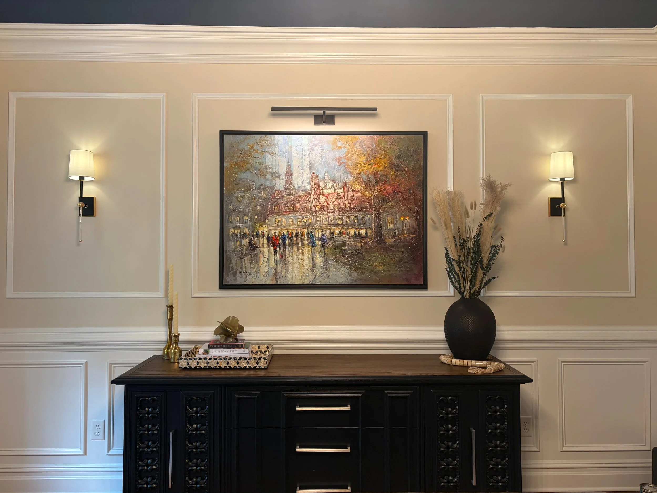 After: Shadow box molding, layered lighting, and styling