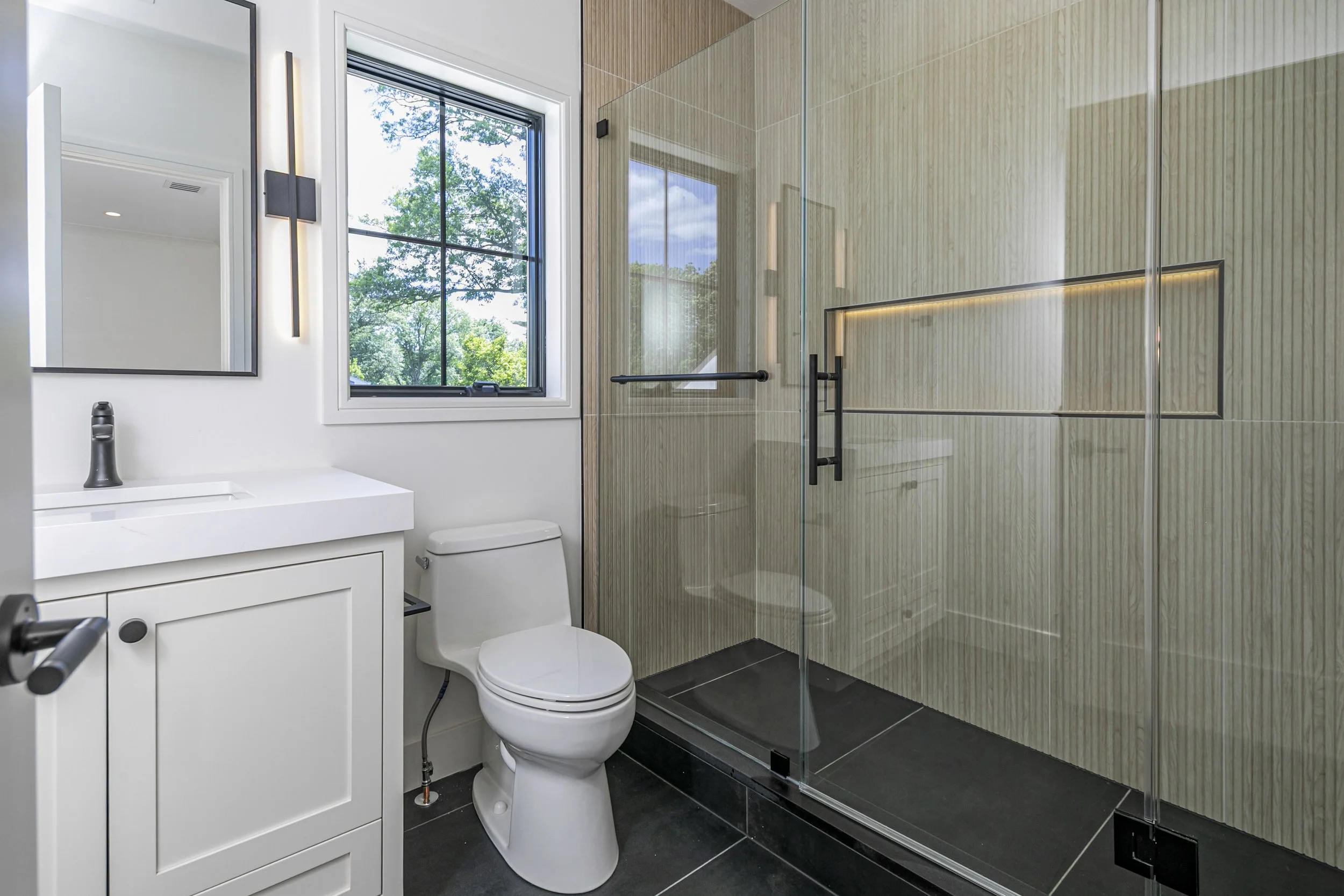 Oak Haven bathroom with glass shower