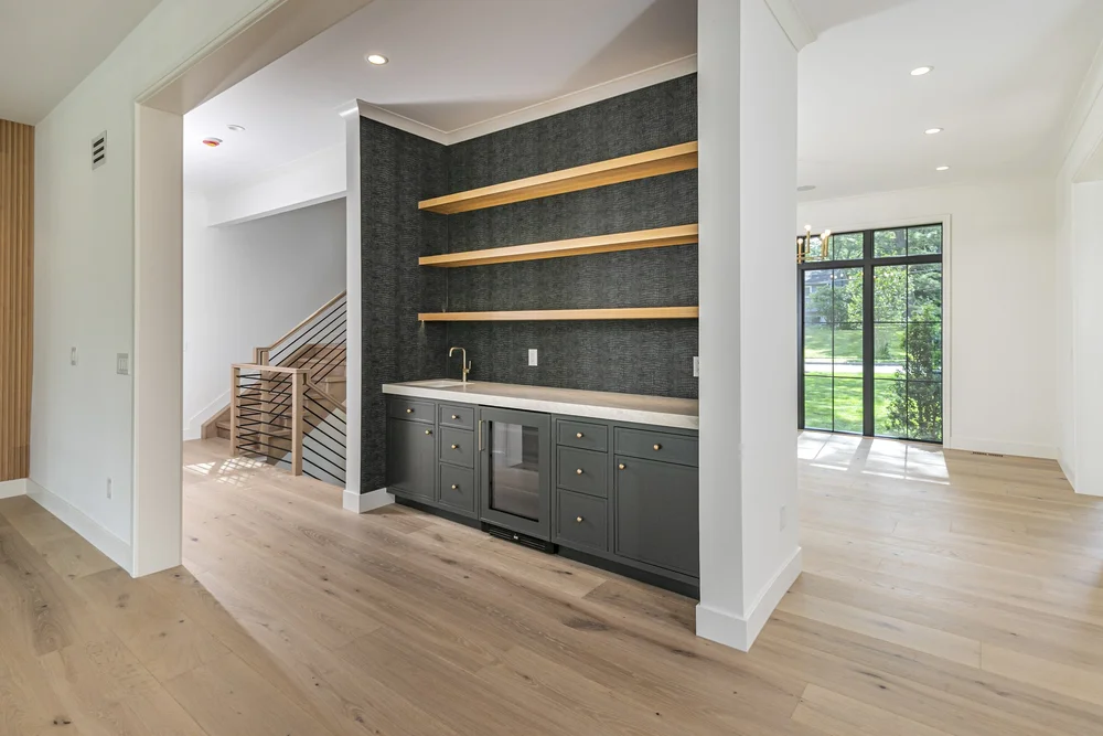 Main-floor bar with custom cabinetry