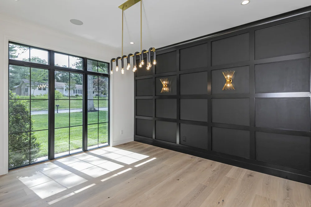 Dining room with decorative wall paneling