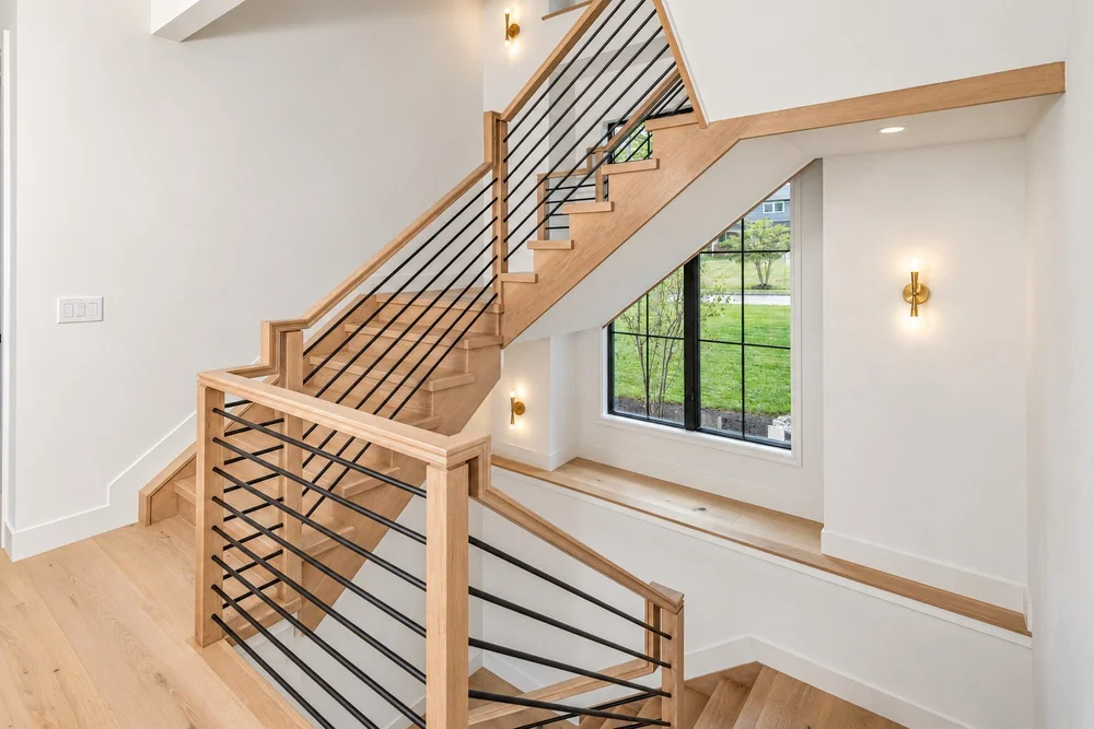 Oak staircase with a contemporary railing