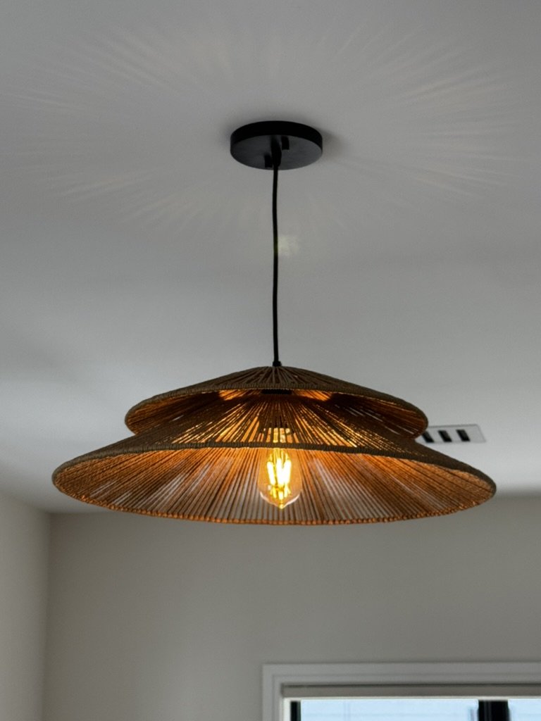 Woven pendant with warm illumination