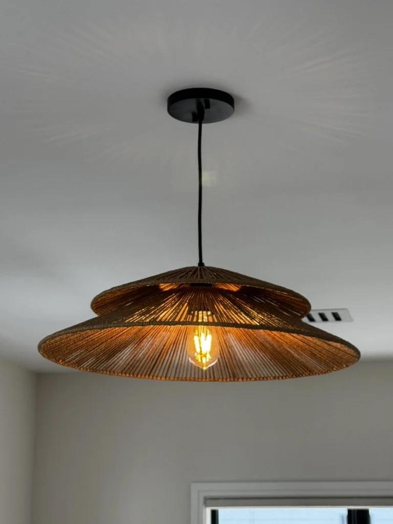 Woven pendant with warm illumination