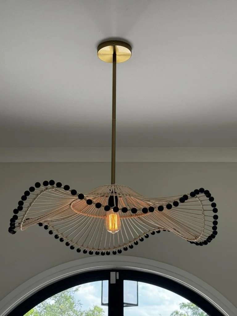 Sculptural foyer pendant with black bead detailing