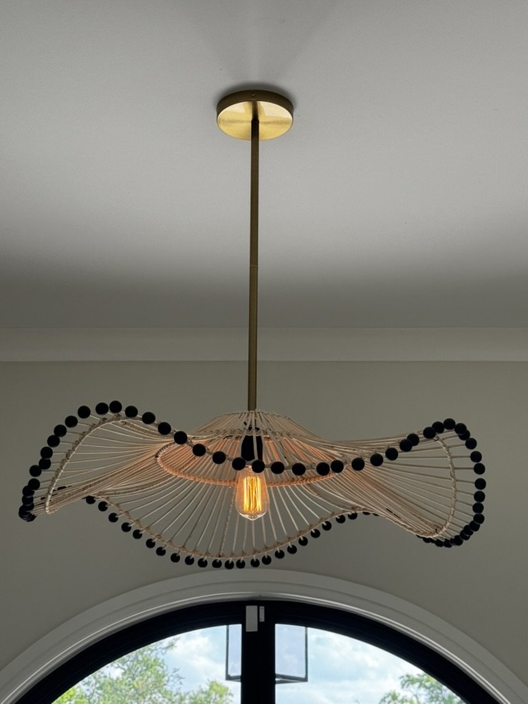 Sculptural foyer pendant with black bead detailing