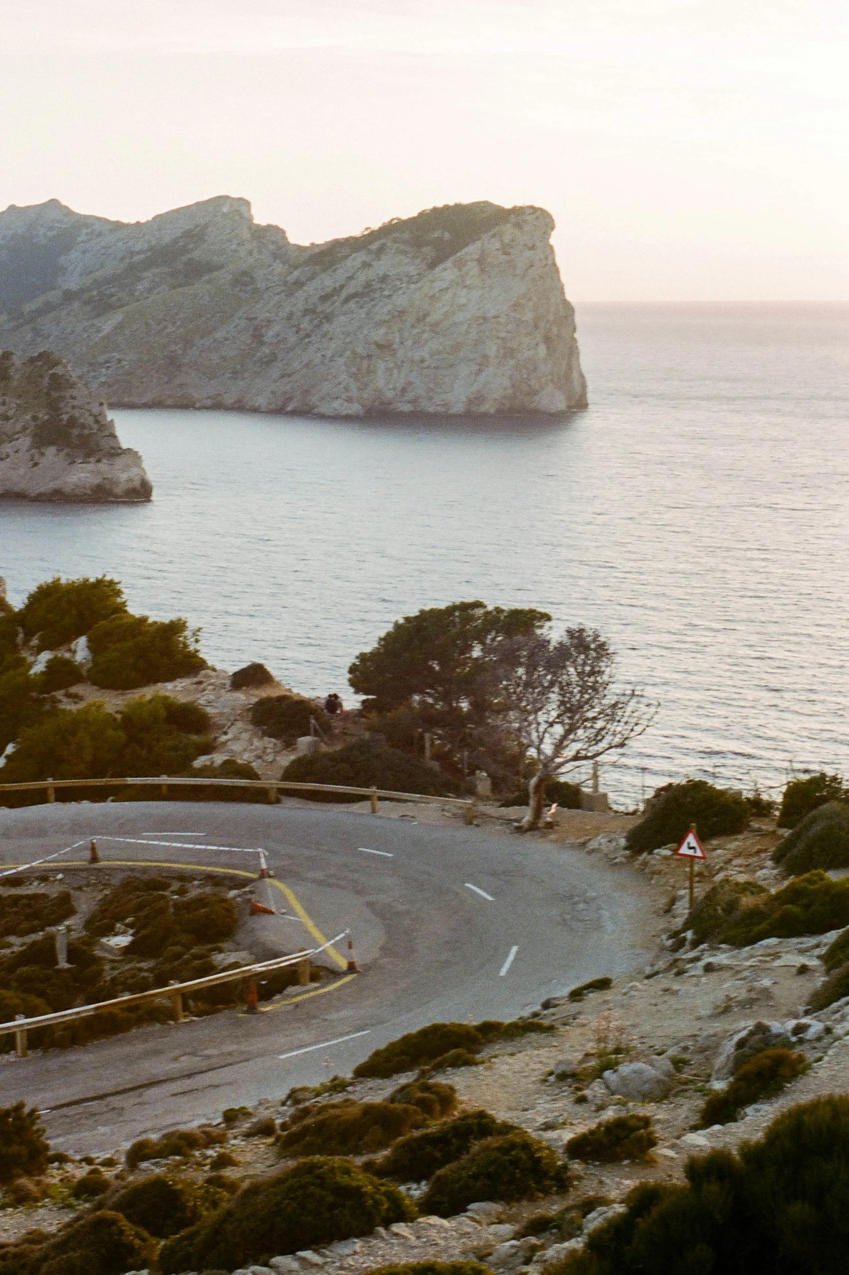 Coastal road curving above the sea at Cap de Formentor, Mallorca