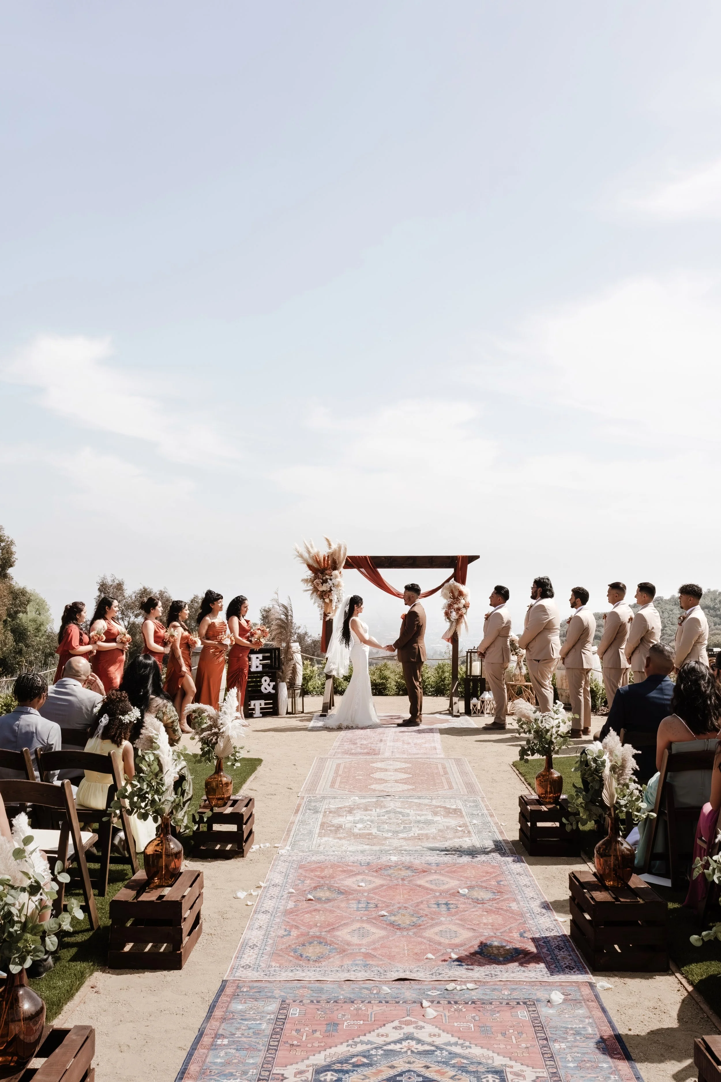 Wedding couple ceremony at Sacred Oak Vineyard Cherry Valley - This Is Cuevas