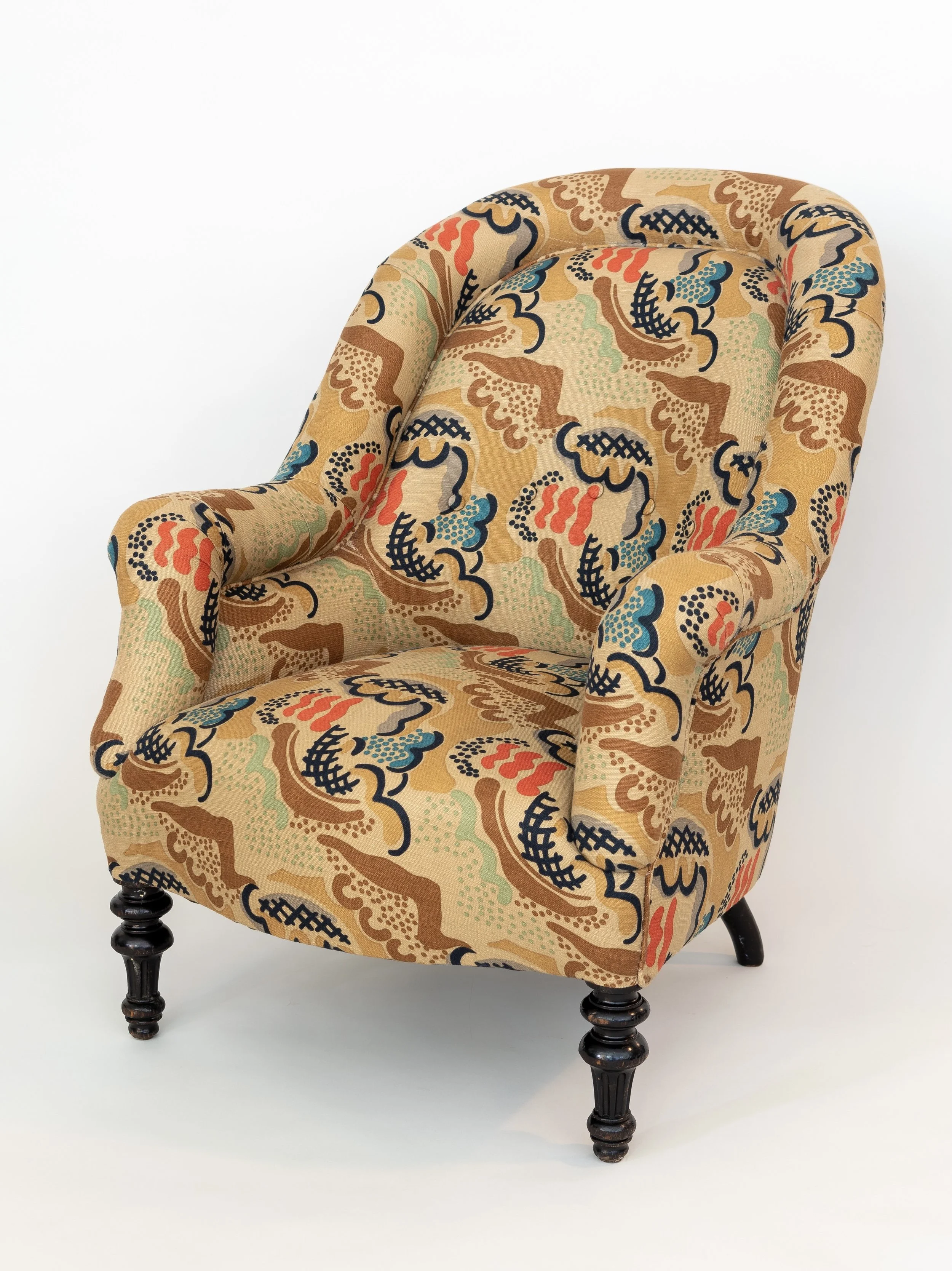 Traditionally upholstered iron back chair