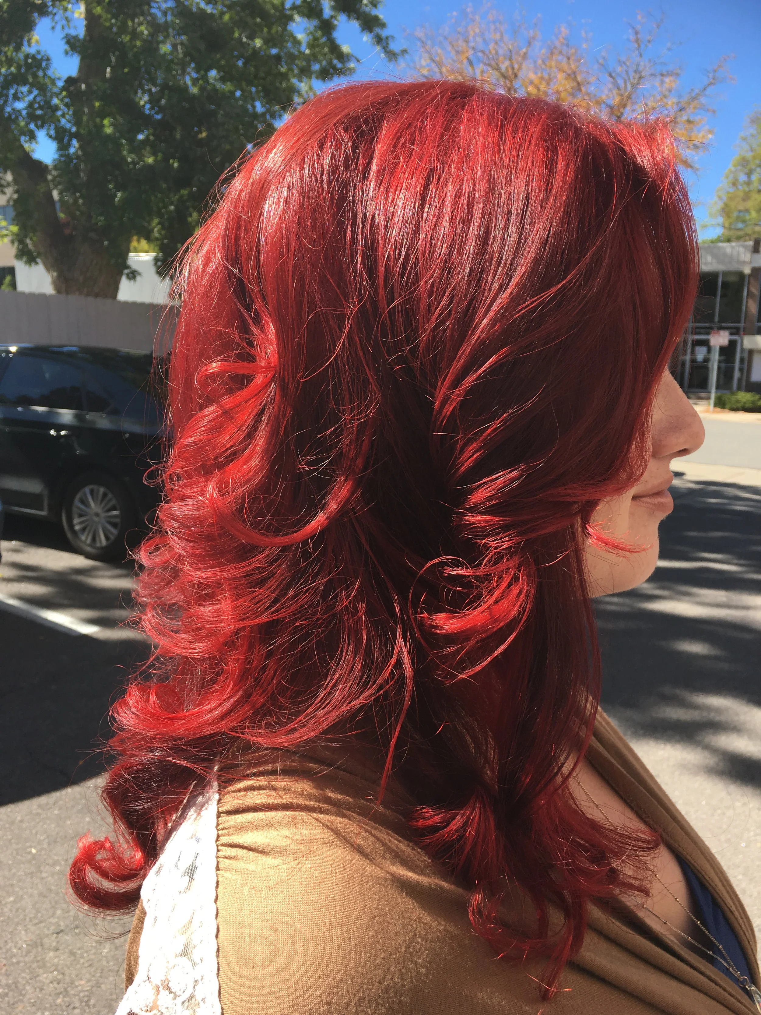 Cherry Red custom hair color in Cherry Creek Denver with dimensional tones