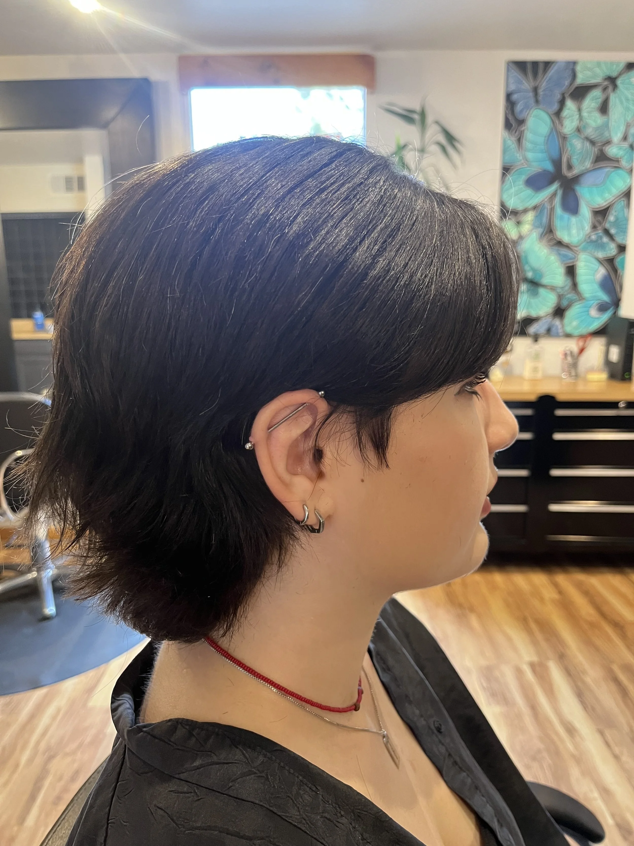 Modern pixie cut in Cherry Creek Denver with soft layers and movement