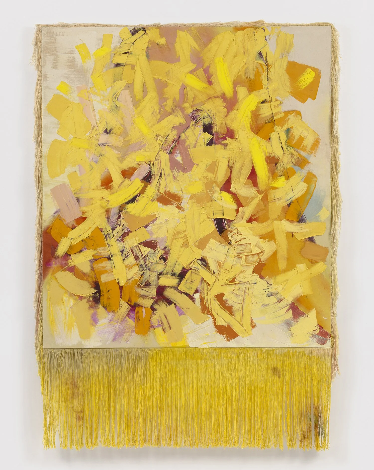 Abstract expressionist painting with yellow, orange, and pink brushstrokes on canvas, framed with beige fringe textile border and yellow fringe at the bottom.