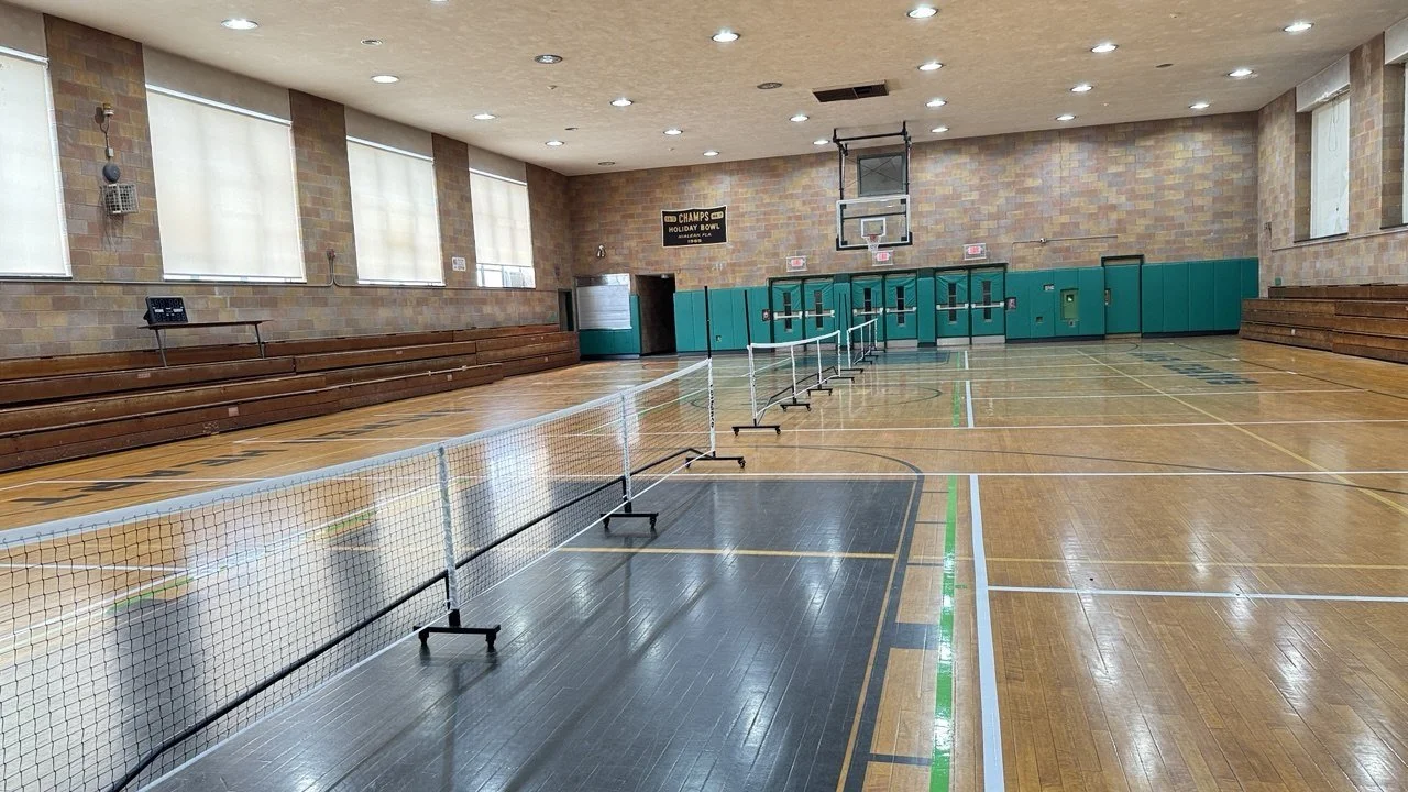 Indoor pickleball and badminton courts, painted lines, free parking, open 7 days