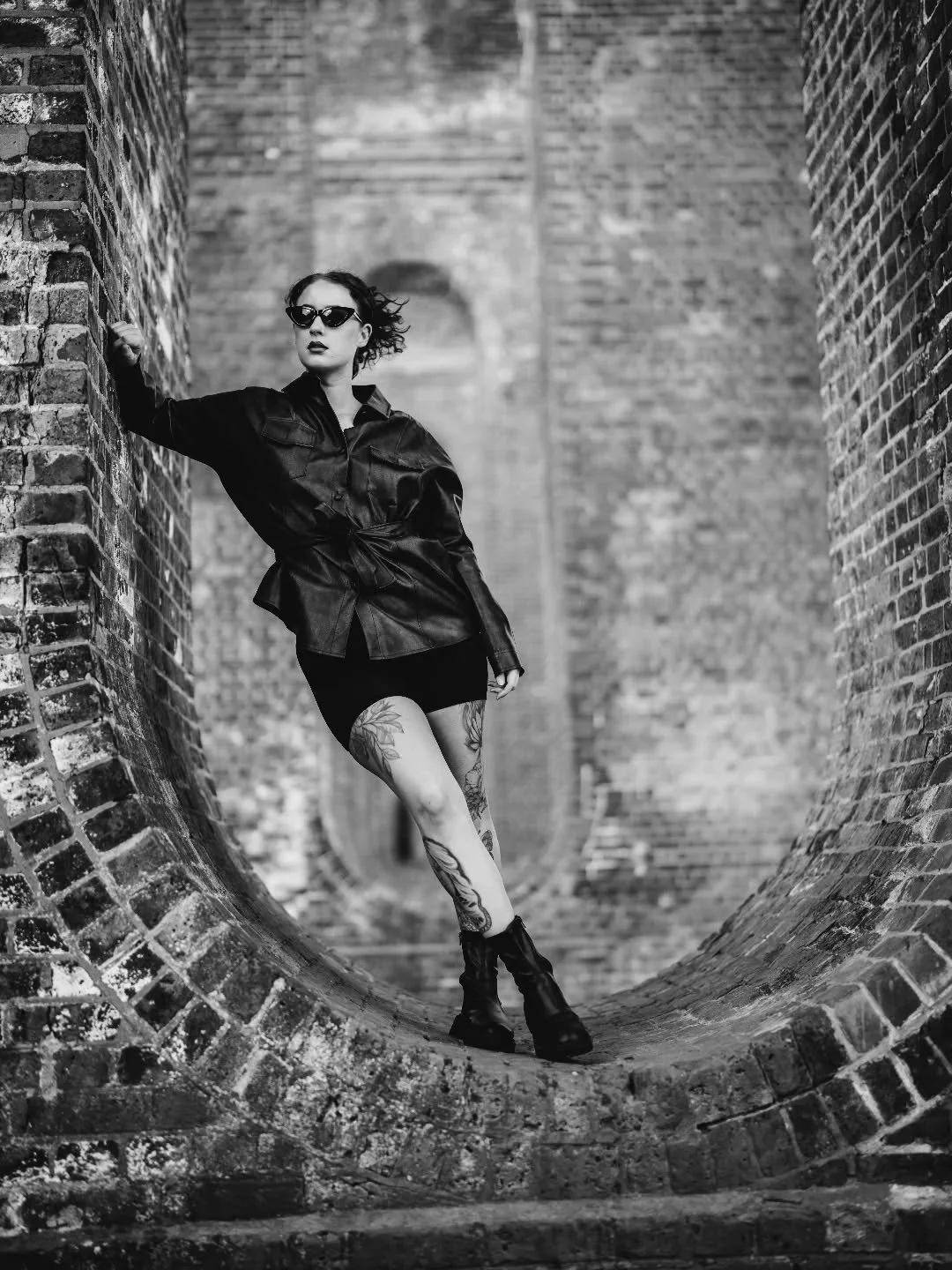 Concrete soul, leather heart 🖤

I love the way the viaduct frames this shot. The texture of the brickwork, the contrast in the light, and the depth of the arches make the whole image feel so cinematic.

#essexphotographer 
#braintreephotographer 
#c