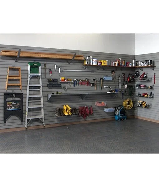 Garage wall with organized tools, ladders, shelves, and storage items.