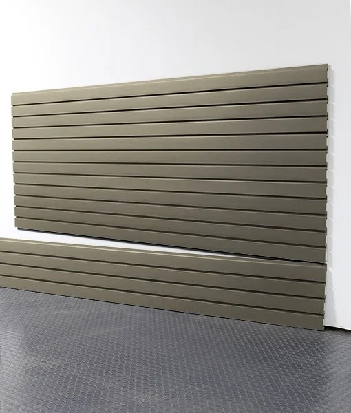 Gray horizontal slat wall panel leaning against a white wall.