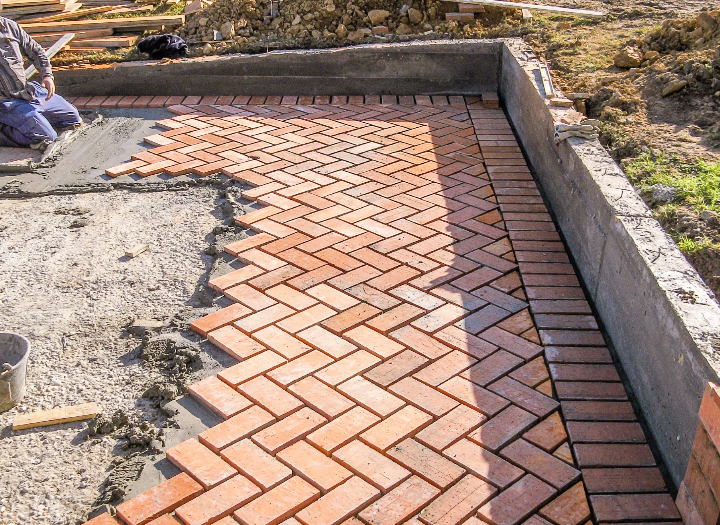 orange-brick-paving-stones-in-construction-process-2026-01-09-08-09-41-utc.jpg