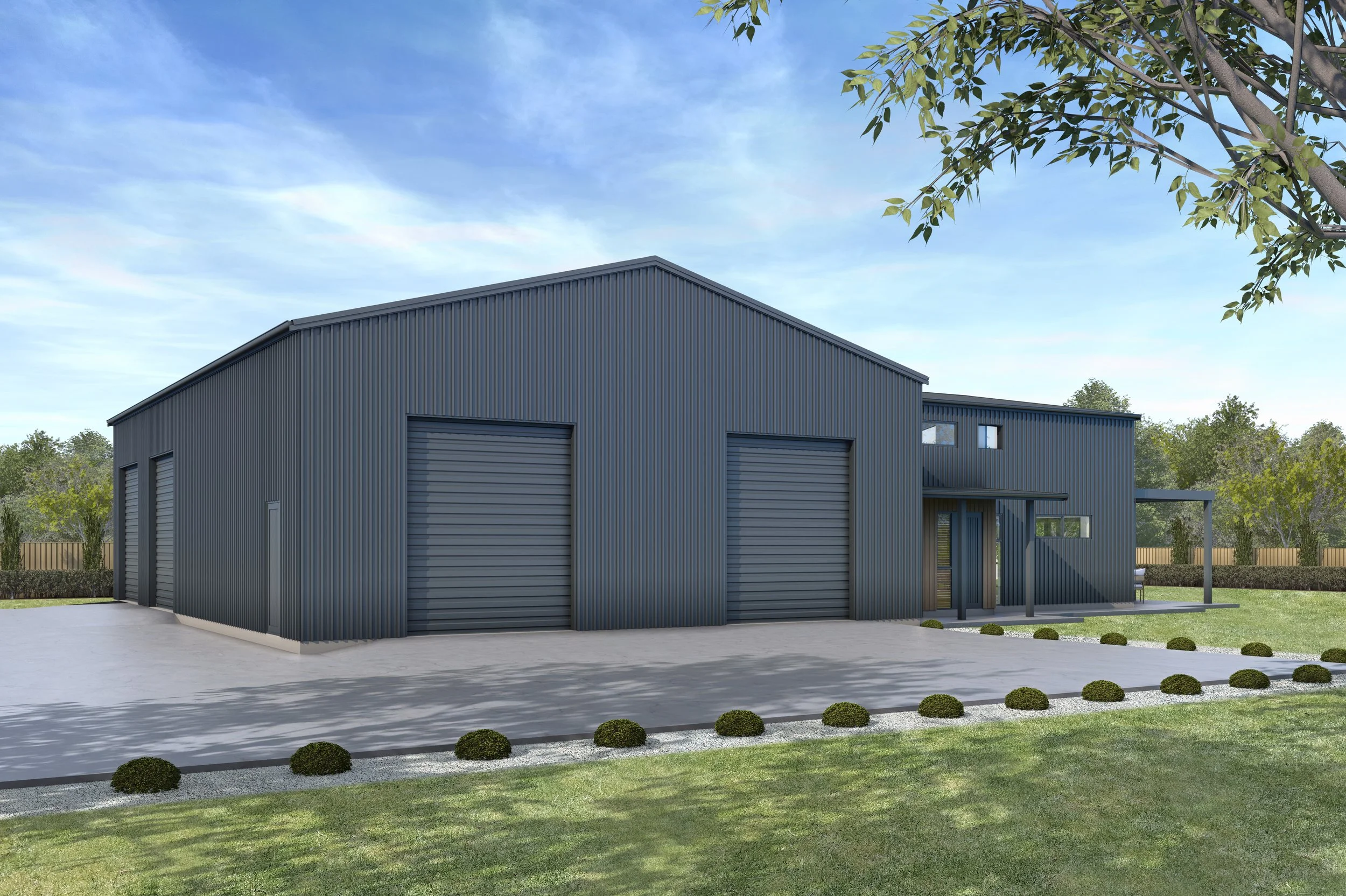 A modern metal building with three large garage doors, surrounded by a concrete driveway, grass, and small bushes, with a patio area and trees in the background under a partly cloudy sky.