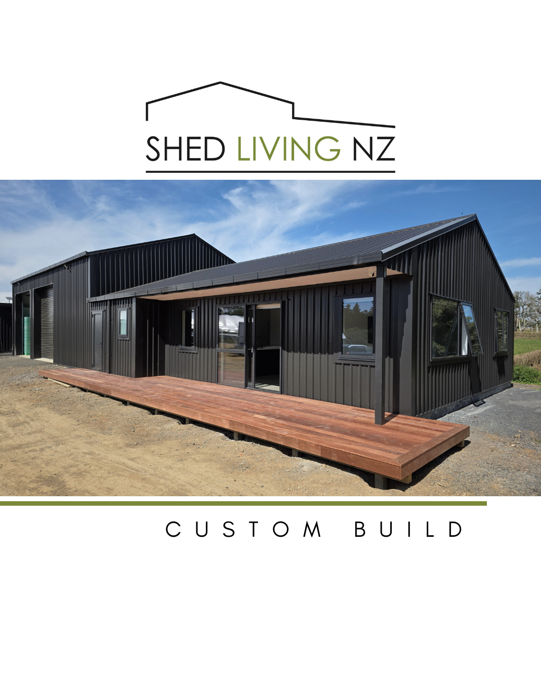 Modern black metal building with wooden deck, clear sky, and logo of Shed Living NZ at the top.