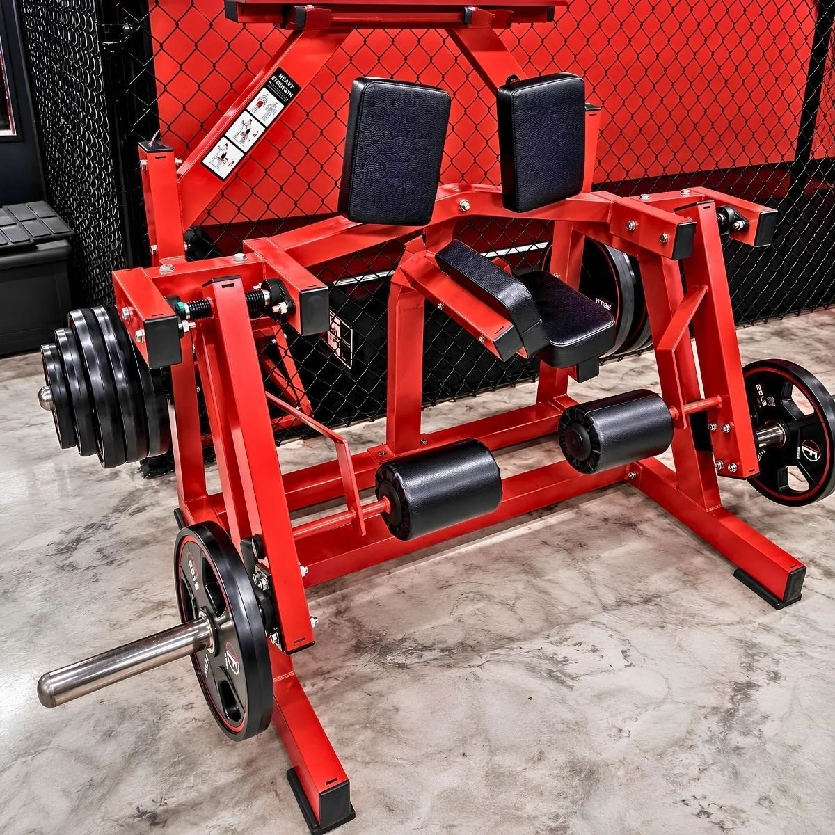 Plate-loaded back extension machine for posterior chain training.