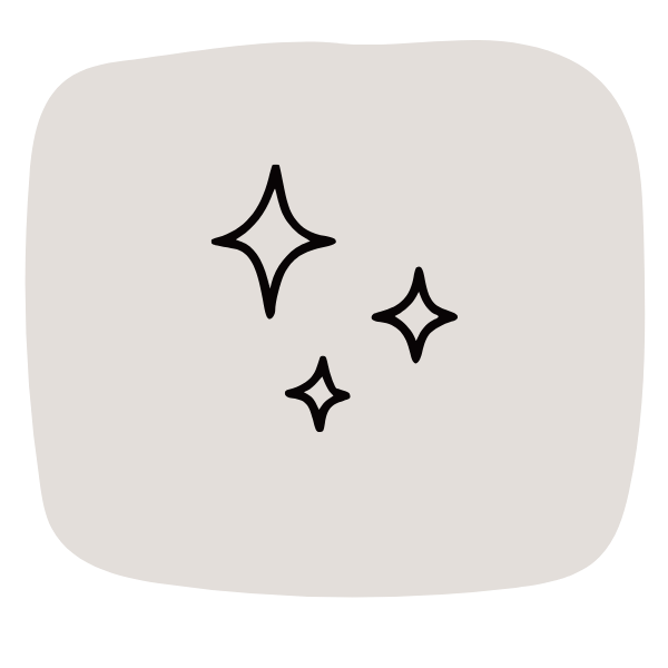 Three sparkles or stars on a light-colored background.
