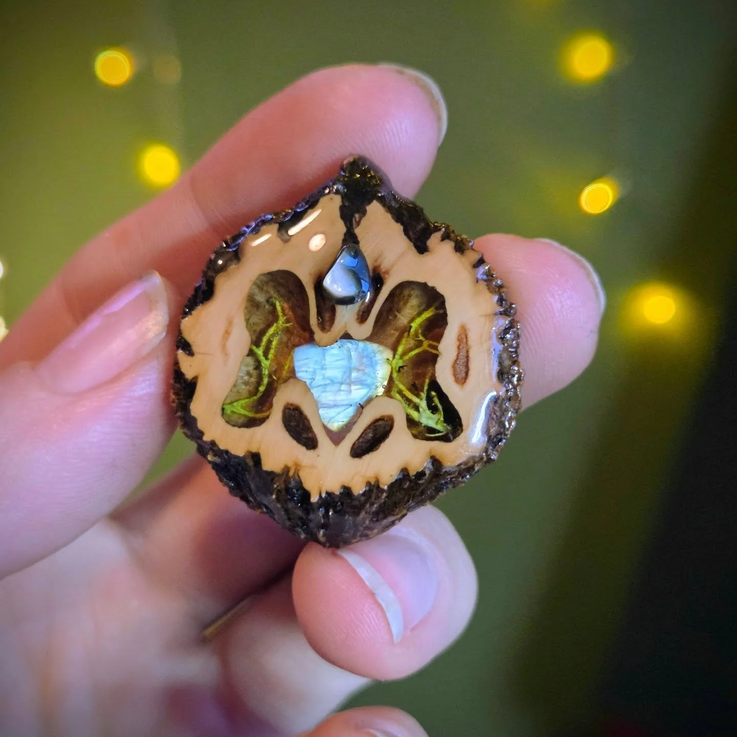 Hidden inside a walnut&hellip; a little galaxy. ✨

Nature&rsquo;s patterns + moonstone magic = one-of-a-kind jewelry.

Handmade with wild heart energy. 🌿

www.saraannaart.com

#hippiestyle  #WalnutJewelry #NatureInspired #HandmadeWithLove #moonstone
