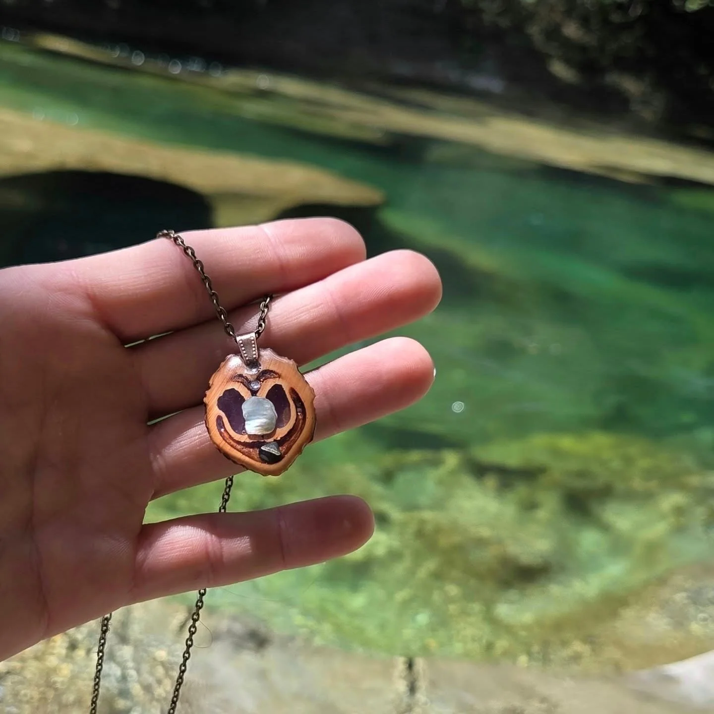 ✨ Nature holds little pieces of magic everywhere you look. ✨

Handcrafted from walnut shell and ocean treasures, this tiny pendant feels like carrying a hidden spring with you wherever you go. 🌿💧

There&rsquo;s something so grounding about creating