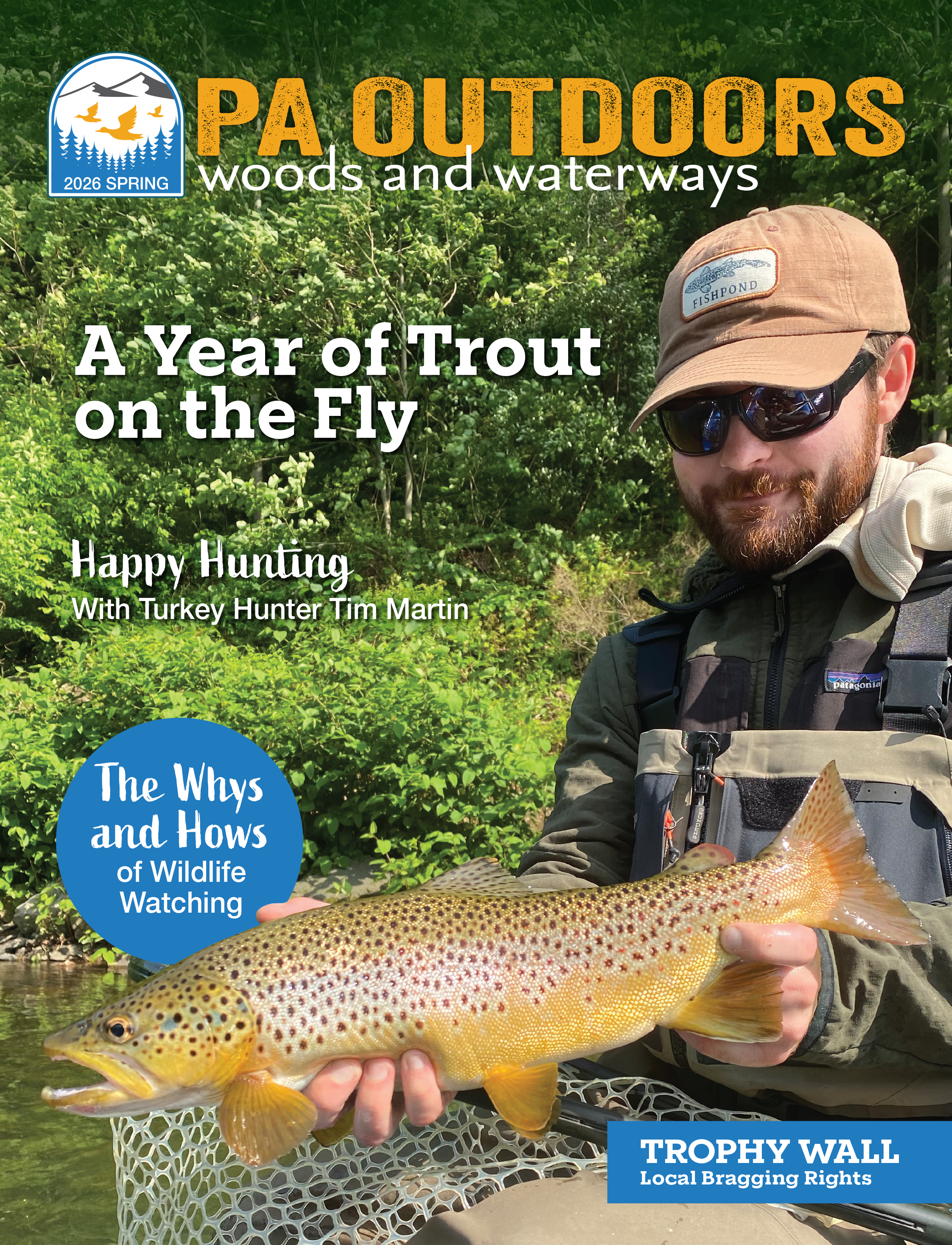 Magazine cover featuring a man wearing sunglasses and a hat, holding a large trout over a stream, with dense green forest in the background. Text includes 'PA Outdoors Woods and Waterways,' 'A Year of Trout on the Fly,' and other magazine details.