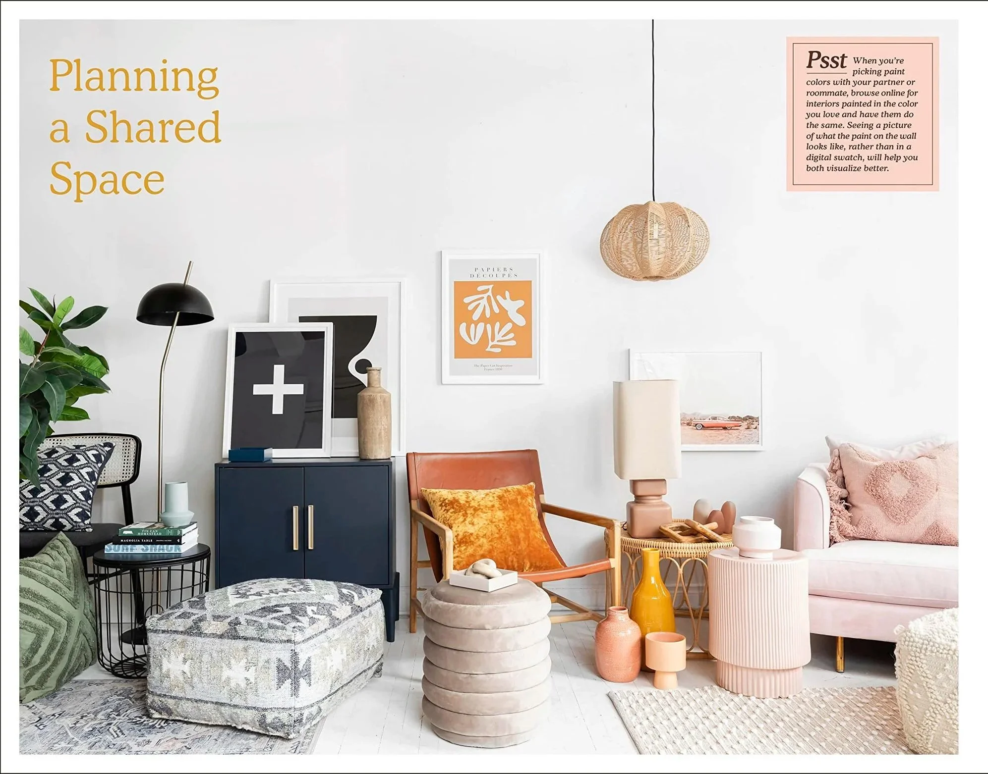 Home Decor Youtuber Alexandra Gater Book. A prop styled photograph of a living room with modern decor, including framed artwork, a pink sofa with pink pillows, a wooden chair with an orange cushion, various decorative vases.