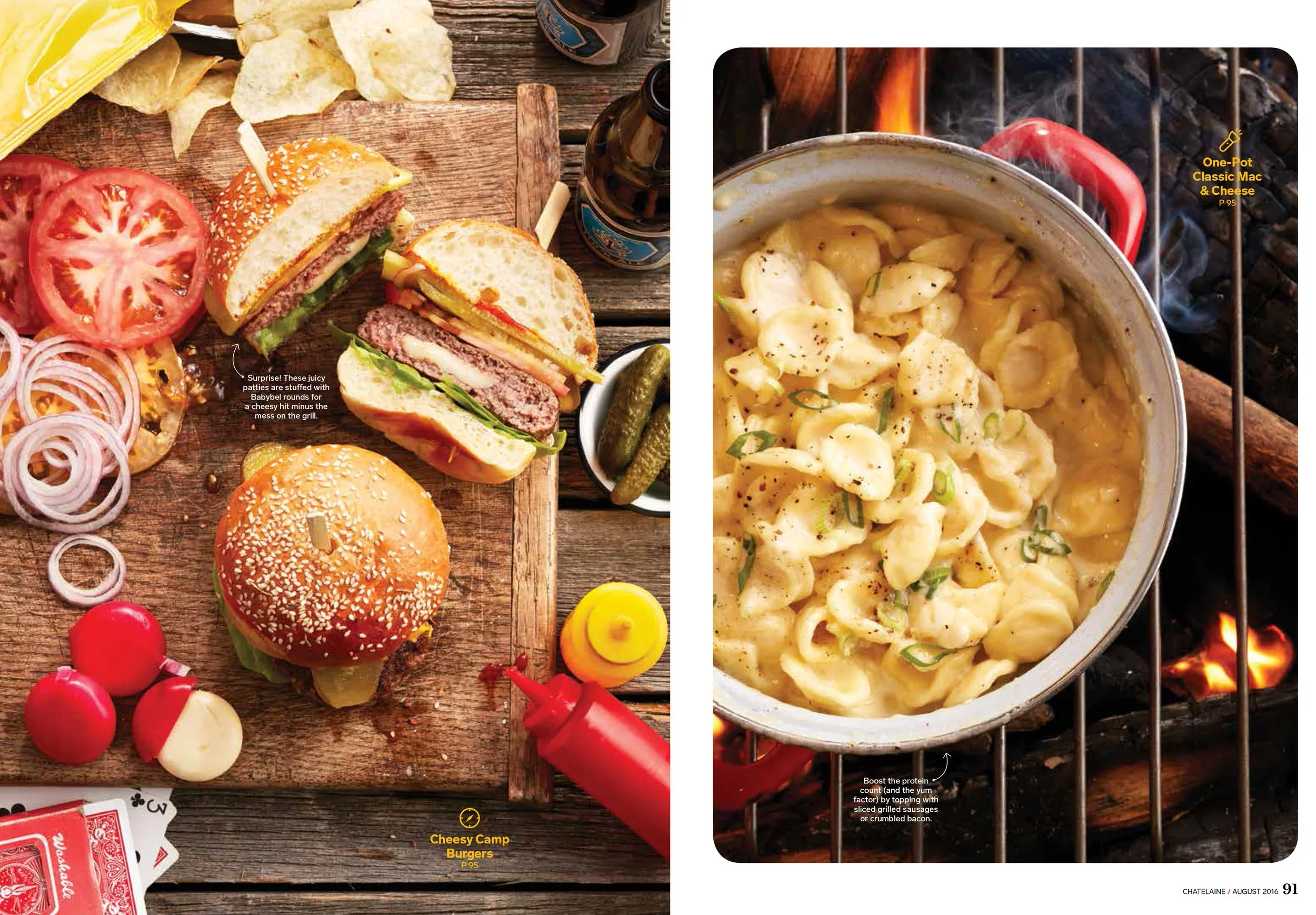 Chatelaine Magazine, styled by rayna marlee. wooden board with cheeseburgers, tomato slices, onion rings, pickles, radishes, potato chips, and beer bottles. Right side shows a pot of mac and cheese cooking over a grill with flames visible underneath.