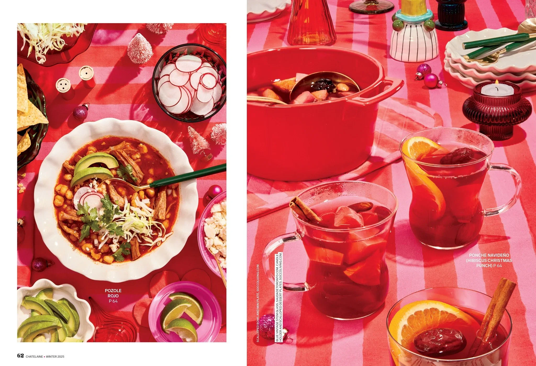 Table set for Christmas celebration with Mexican food and drinks. On the left, a white bowl with pozole rojo garnished with avocado slices, radish slices, cilantro, and shredded lettuce, with a green spoon. Nearby, small pink bowls with lime wedges. 
