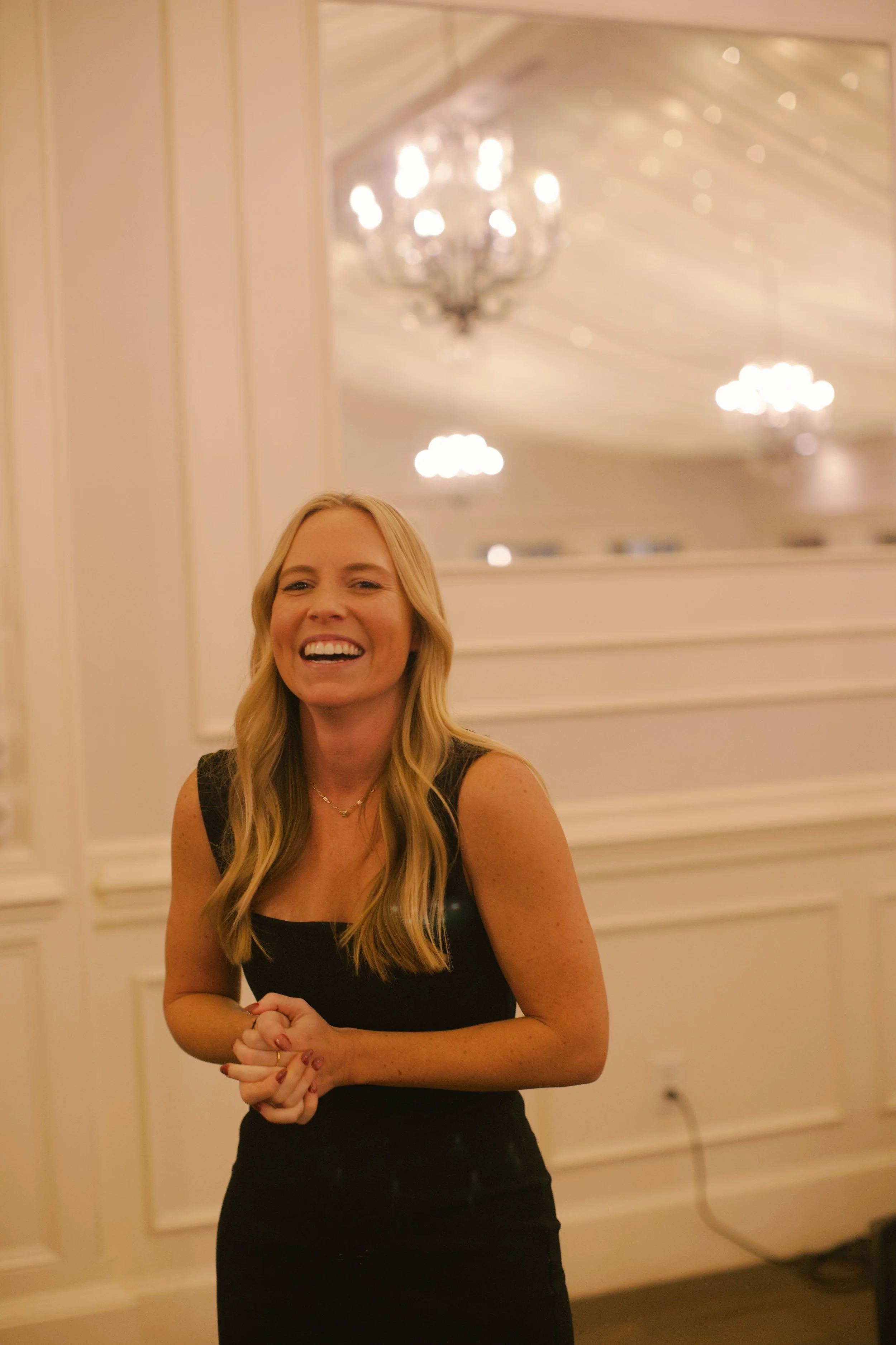 Photo of Lauren Clark speaking at a banquet