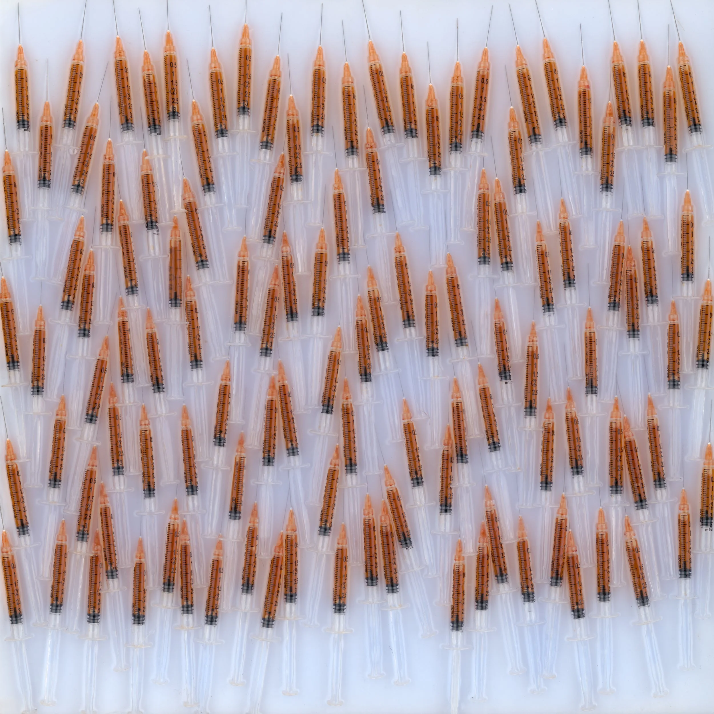 Island Rum (2025) 24" x 24" Dark rum in syringes in tinted epoxy on ACM