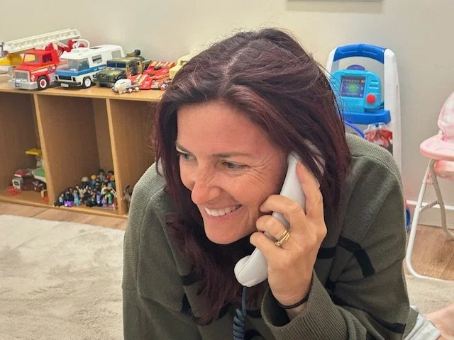 Sarah Everett laughing during a play session