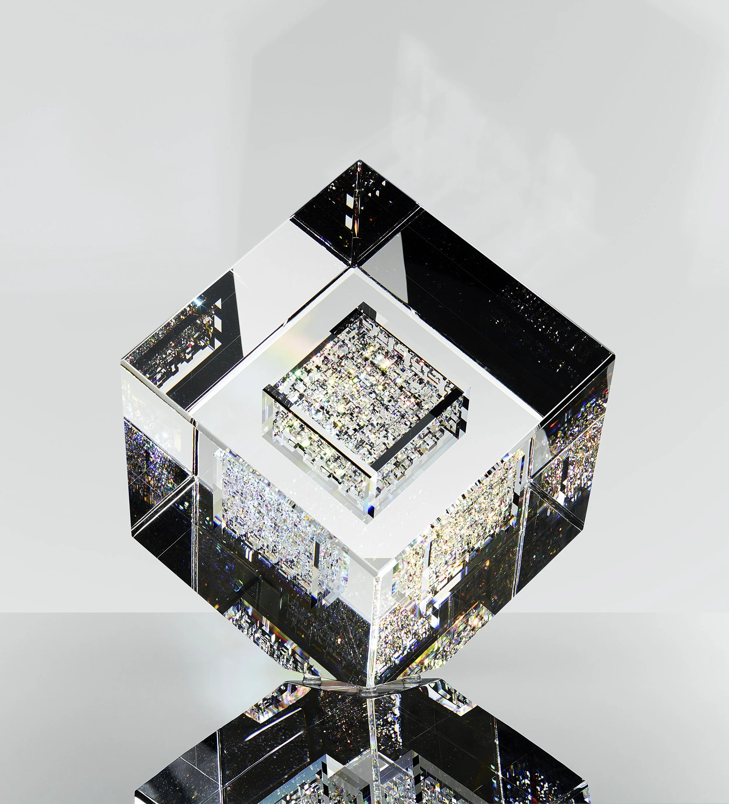 Jon Kuhn (American, born 1949.)  Sigma 5 , 1997. Laminated and polished glass. 13 x 11 3/8 x 11 3/8 inches. Cafesjian Art Trust, 2022.1135.1. © Jon Kuhn 