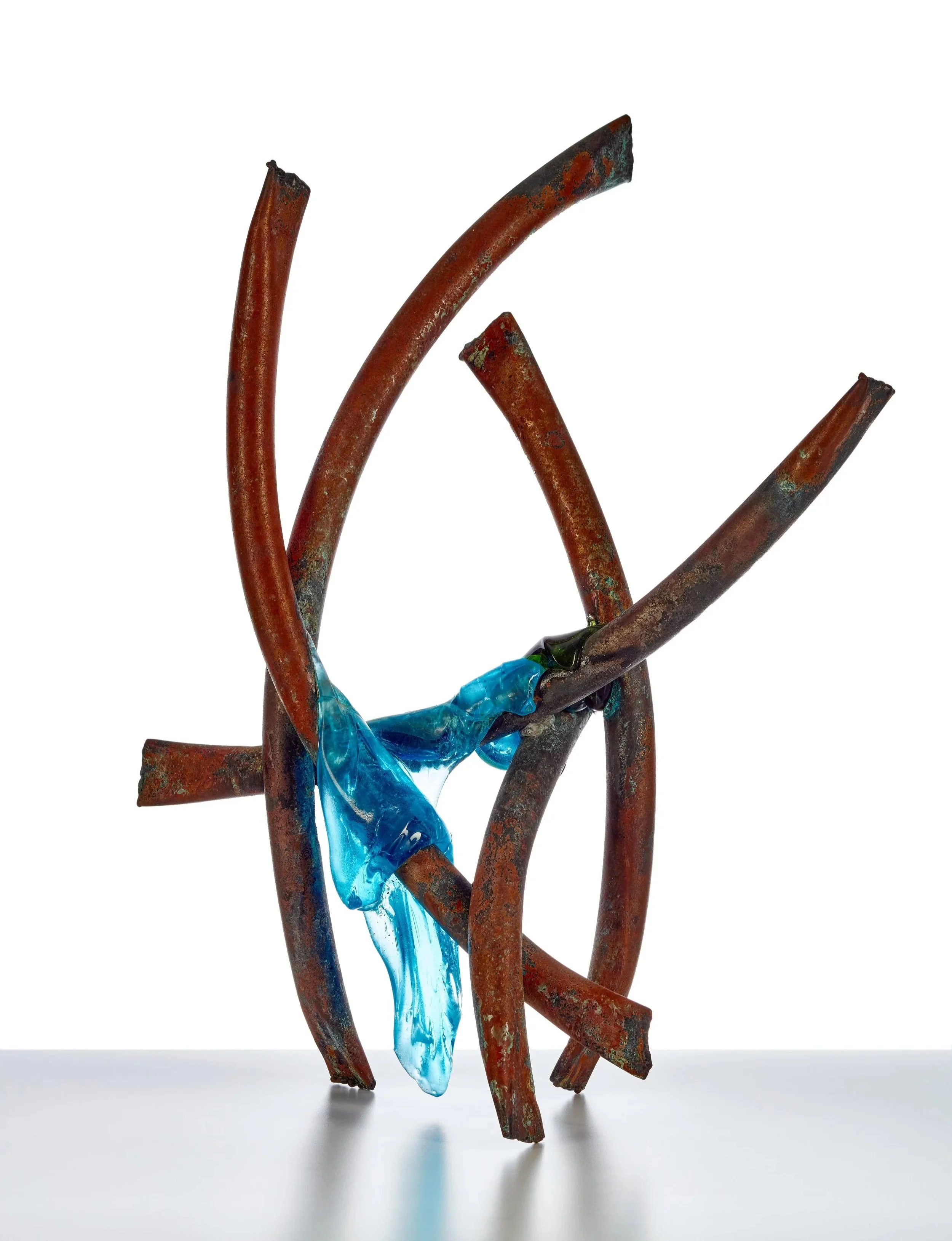  Claire Falkenstein (American, 1908-1977) 
 Fusion Sculpture . Fused glass and copper. 3 x 15 x 9 3/4 inches. Cafesjian Art Trust Museum, 2022.1862.1. © Claire Falkenstein Foundation