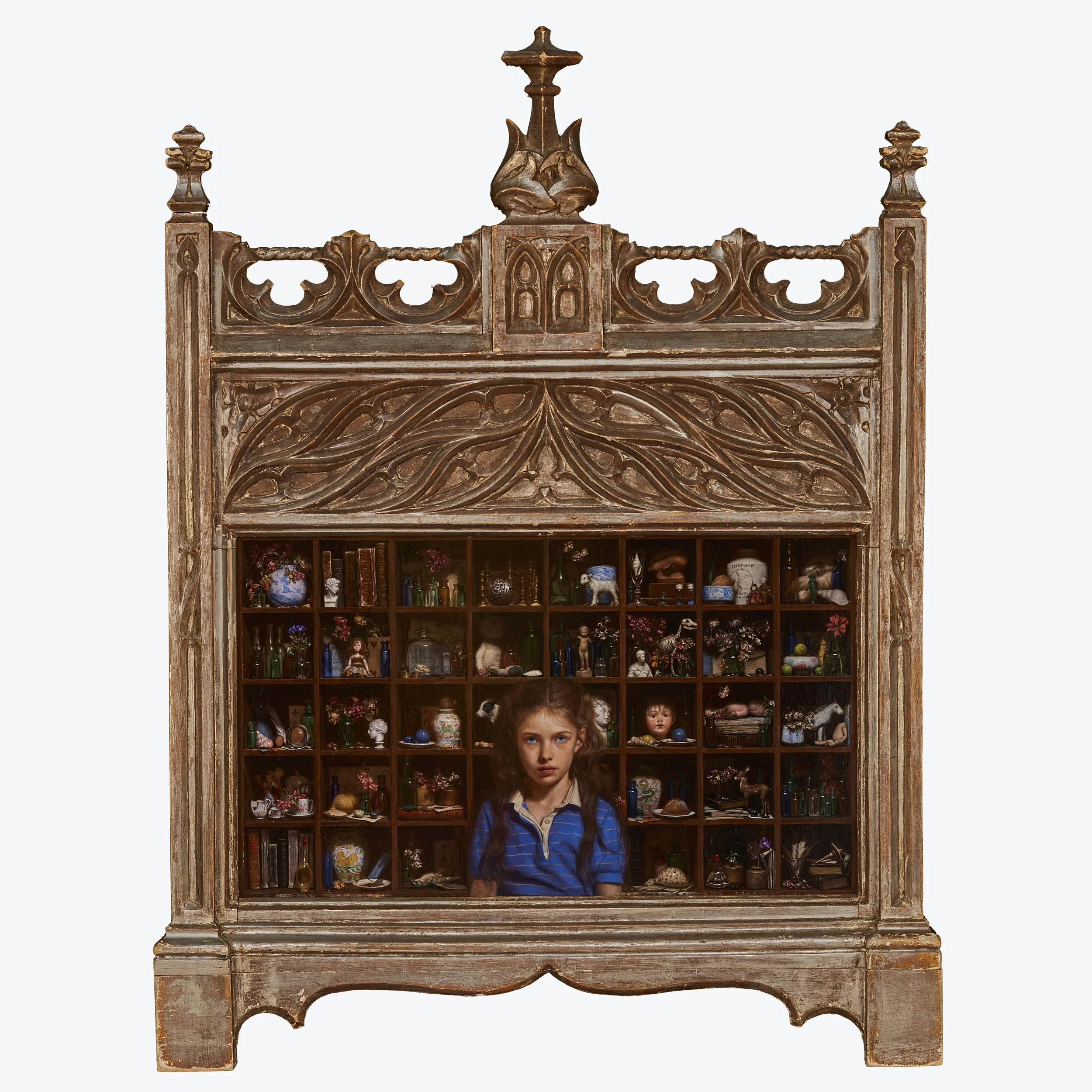 Painting of a young girl in front of rows of shelves with various objects. The frame is wood and ornately carved.
