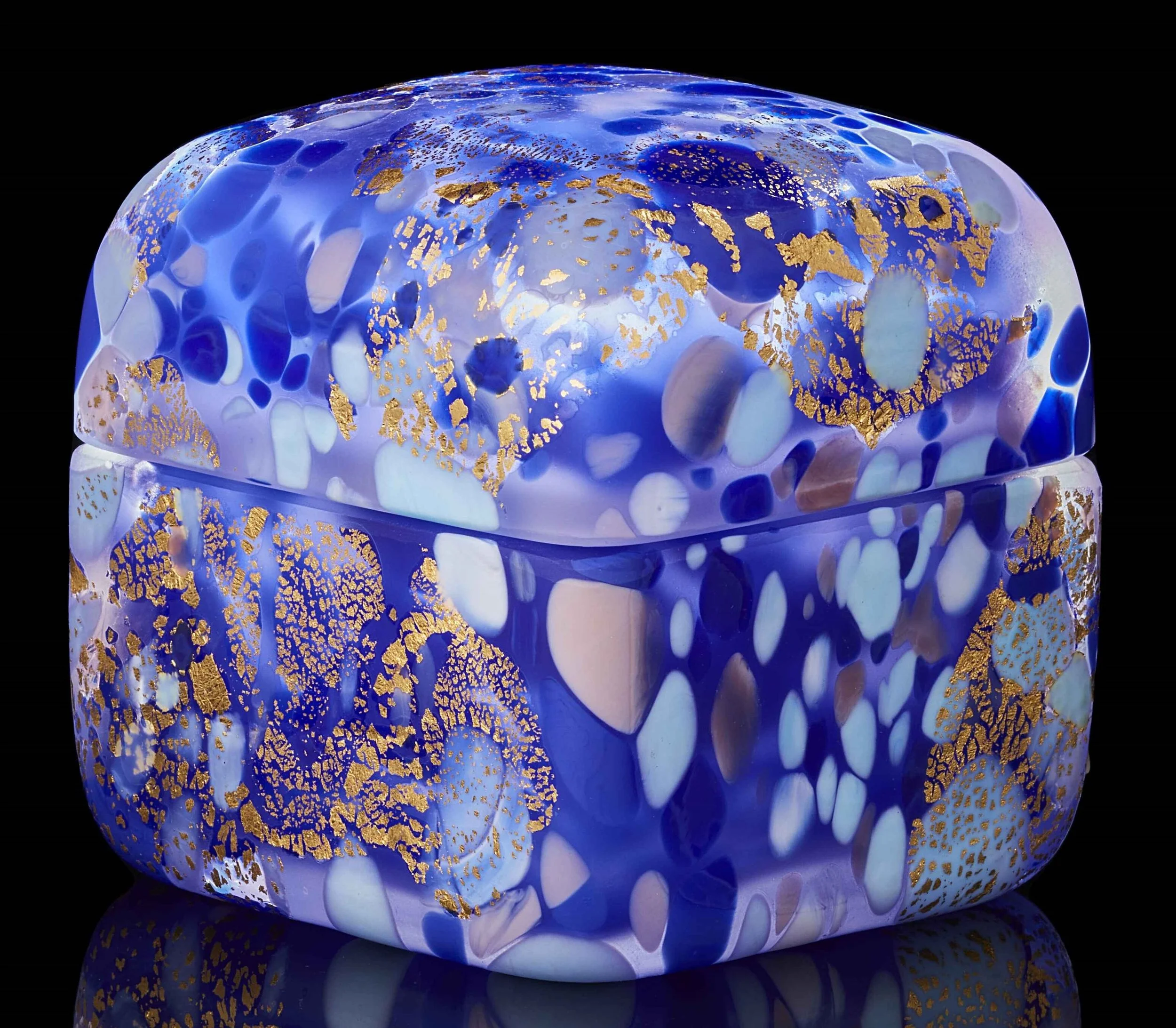 A small blue and gold glass box made by artist Kyohei Fujita