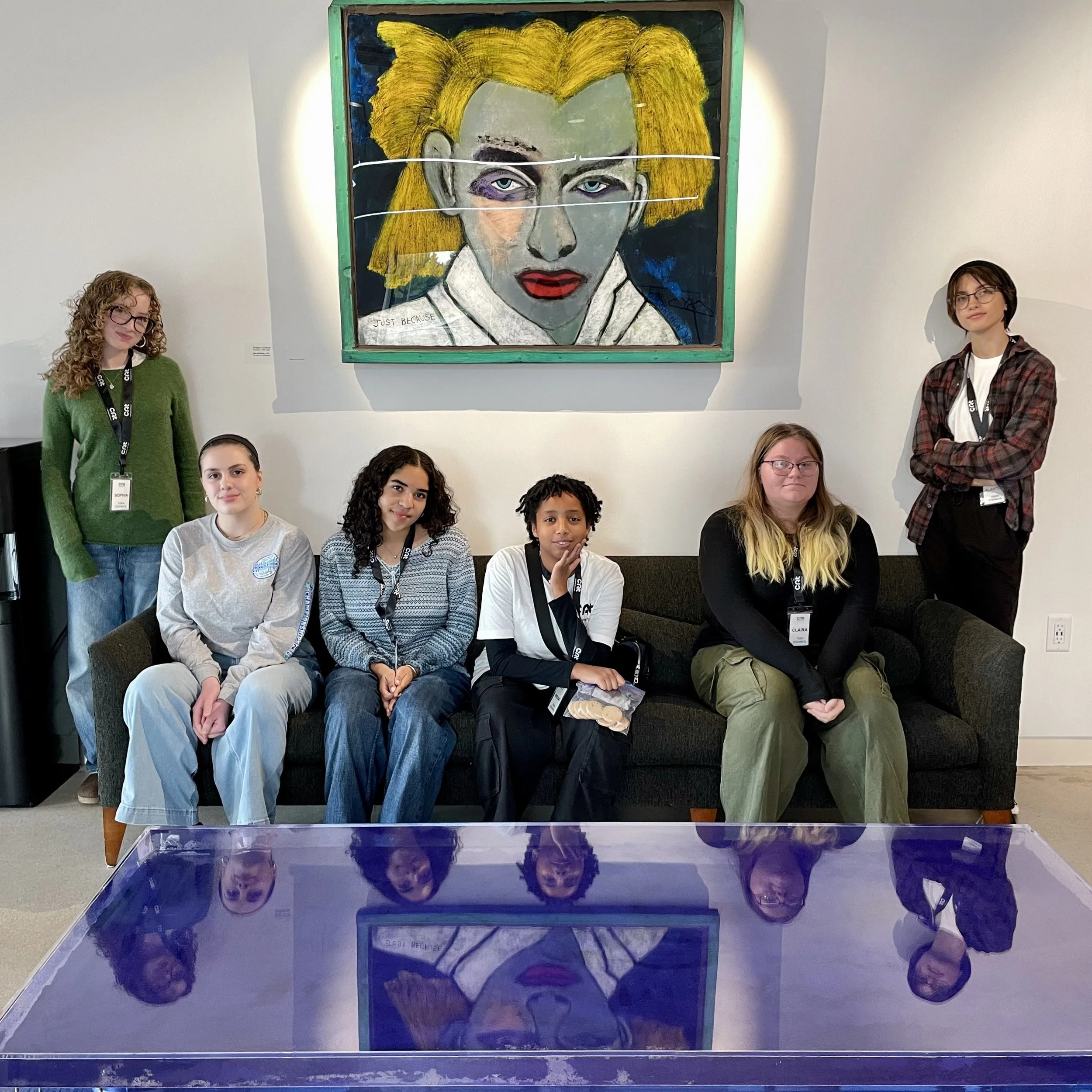 The 2024 Teen Council members posing in the museum lobby.